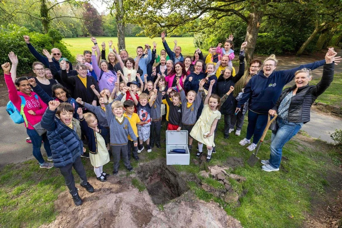 Sale children bury 'time capsule' to be opened in 50 years in local park
