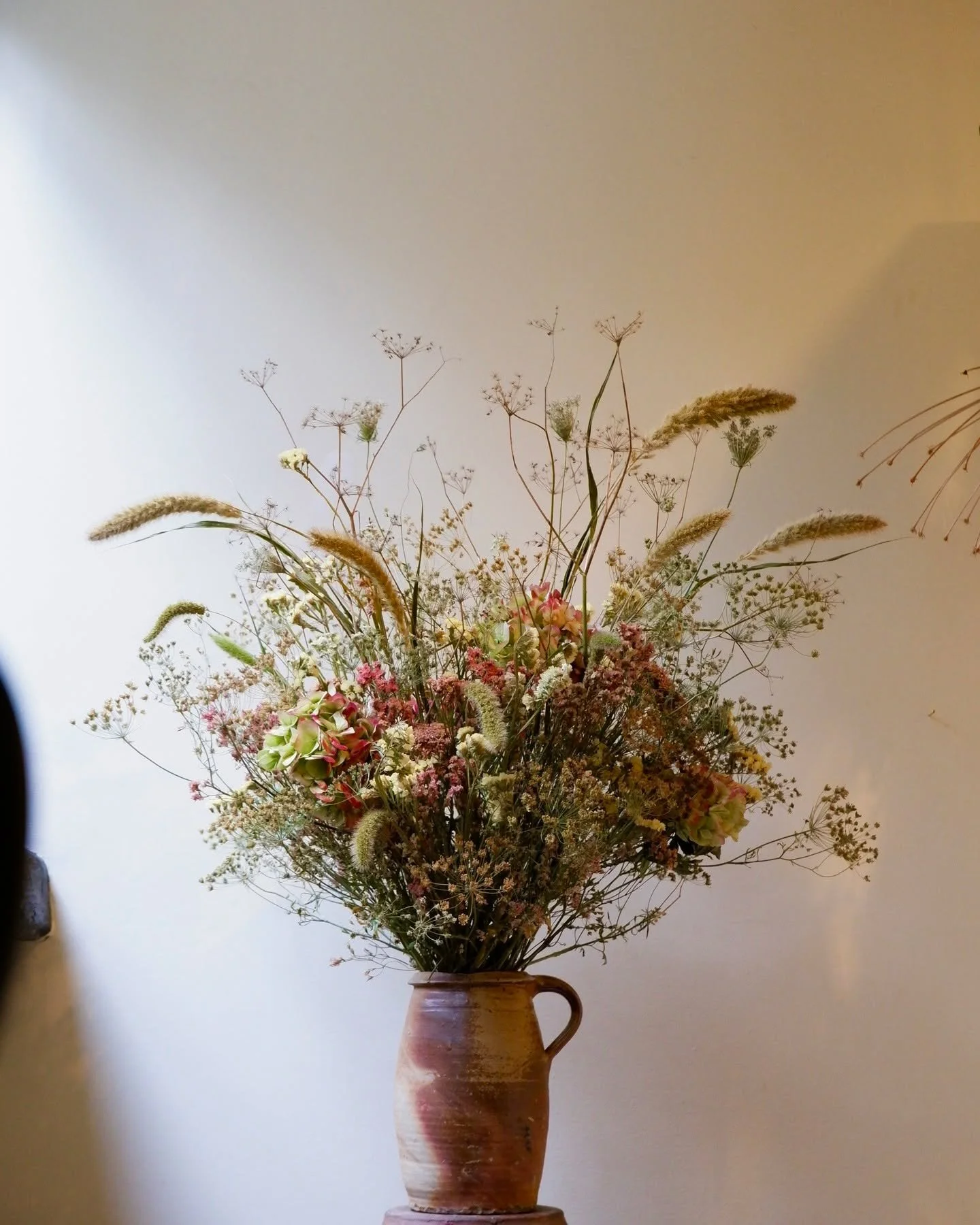 1 of 3 for @thewelldiggersarms 

A play on the soft fade, green -&gt; mustard -&gt; pink.

Fennel seedhead punching upward, hydrangea filling with softness, homegrown foxtail millet grass creating movement.

Botanical and warm, like the garden border