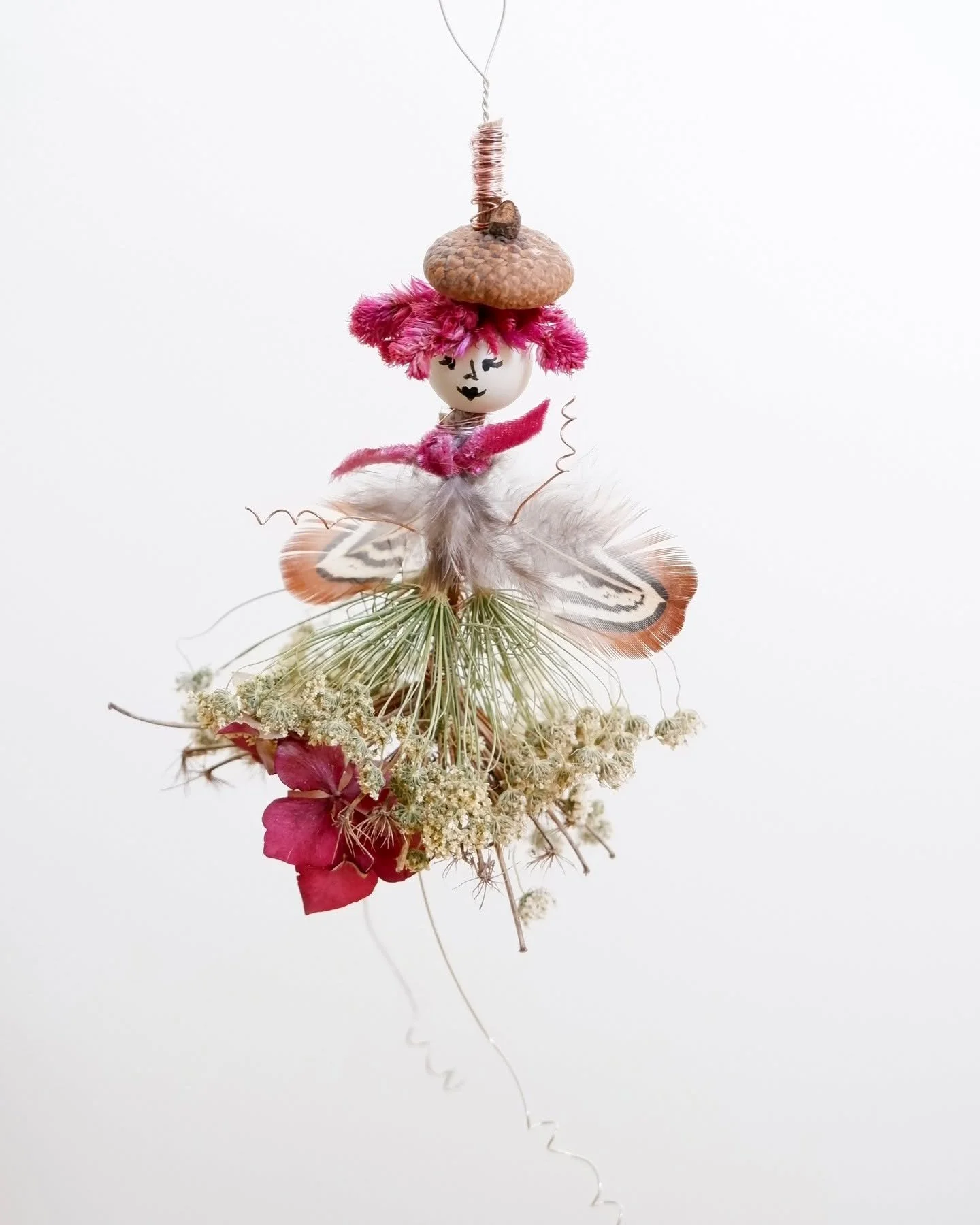 A funky sugar-plum fairy. 🪶🍒

Flaming hair, cravat, floppy beret. She's a bit of an icon.

This year I had time to hand-paint the faces, which I had to muster some confidence for. I'm so happy with how they turned out.

A little cut-off of velvet r