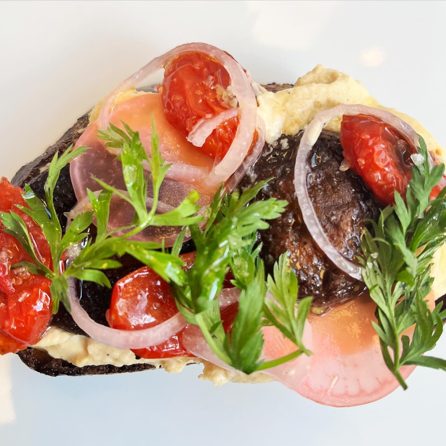 As promised, we present our newest offering on our spring menu: Mushroom Toast. It&rsquo;s 
roasted wild mushrooms over house made hummus with confit tomatoes, pickled vegetables, truffle oil, and carrot greens. #scottandjoe
. 
. 
.
#cheese #cheeselo