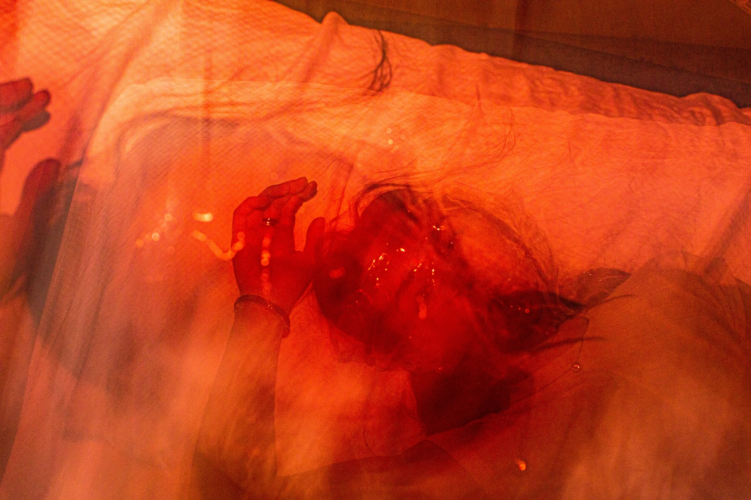 Cast back onto the mattress, broken into pieces. The body lies where it once rest while the heart races in panic, an agonizing room where the fractured self tries to survive the weight of its own skin.