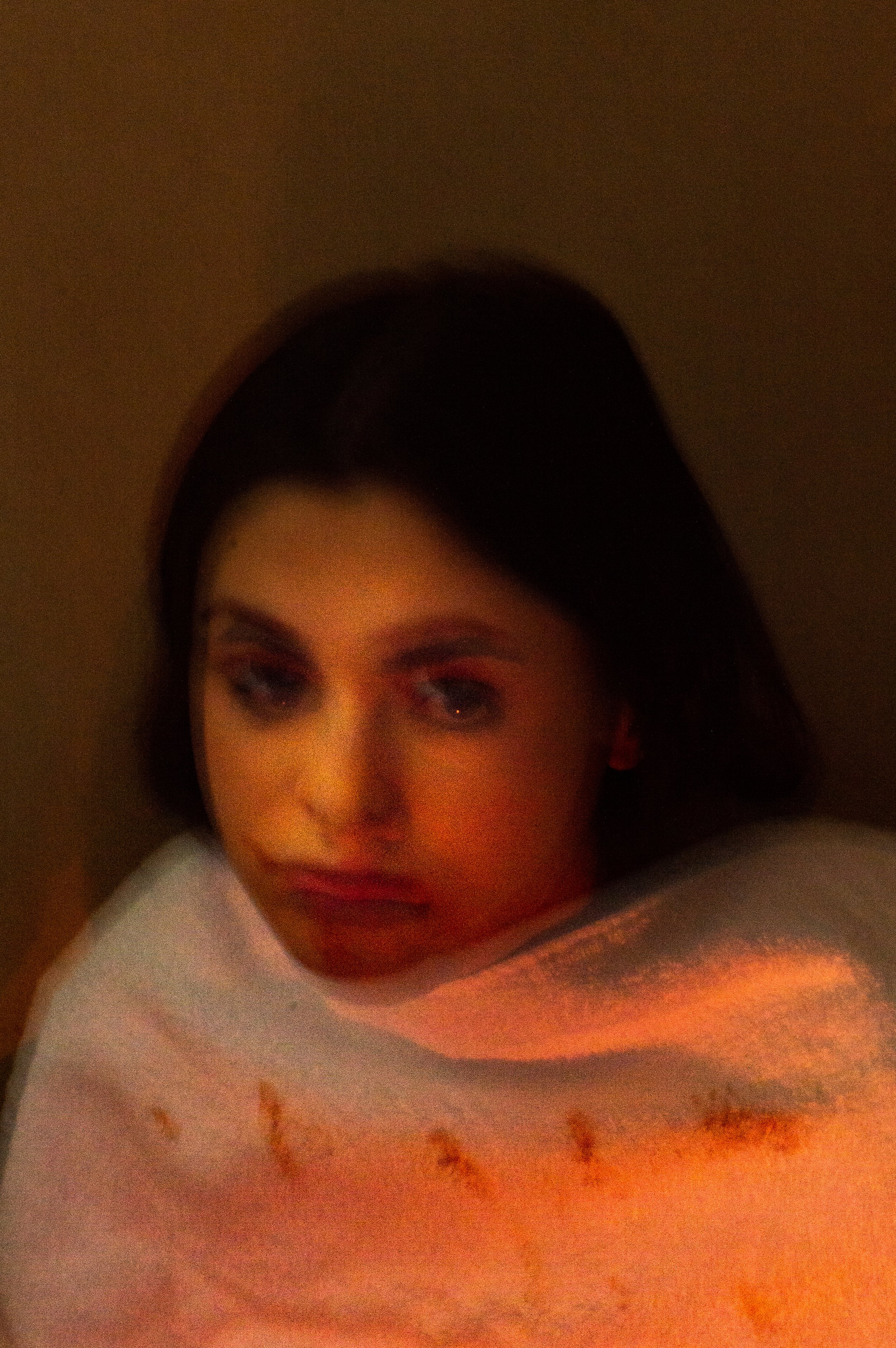 A mouth marked by violence, a face that demands you to witness what words are too soft to say.
