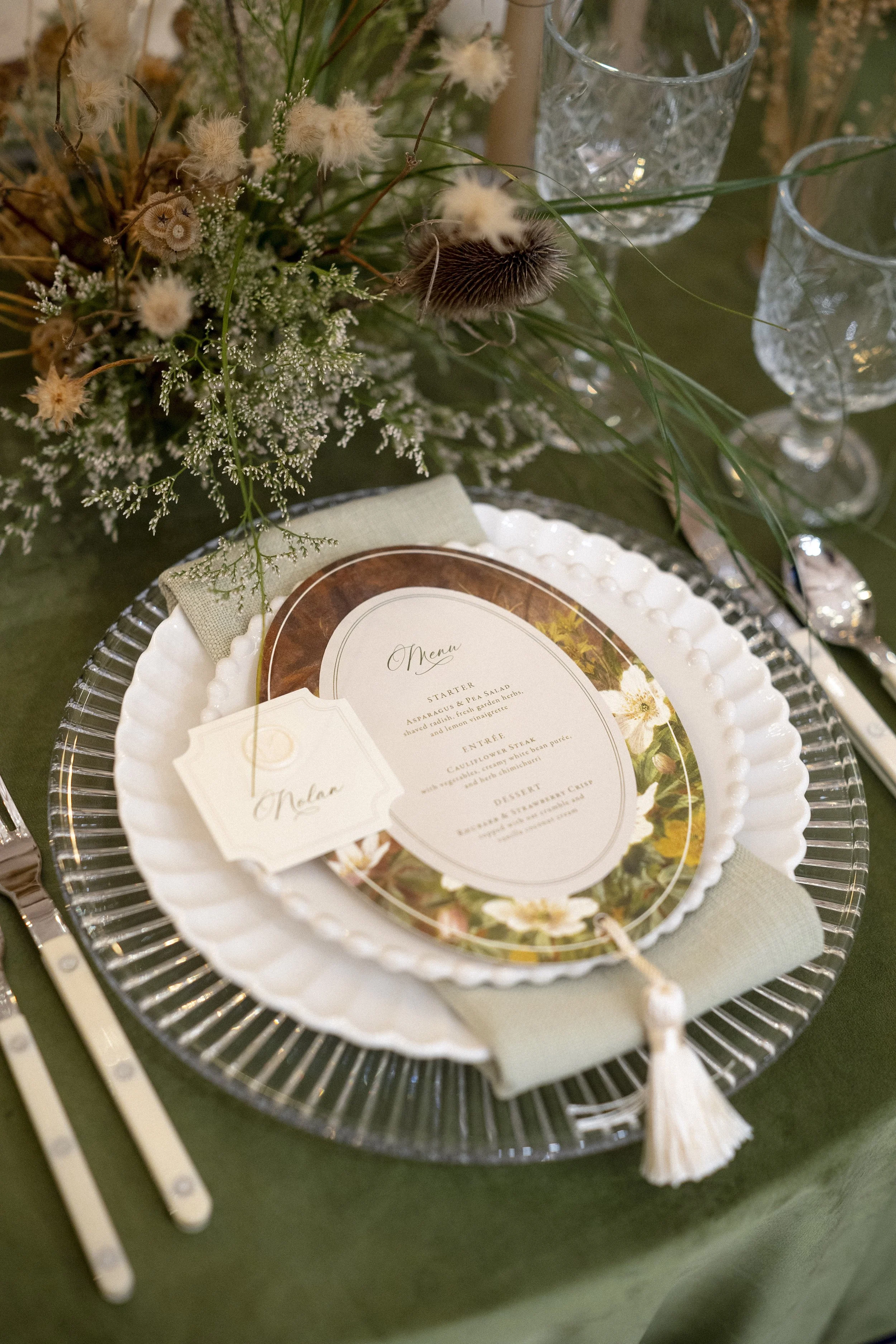 Oval flower menu with tassel and place card 