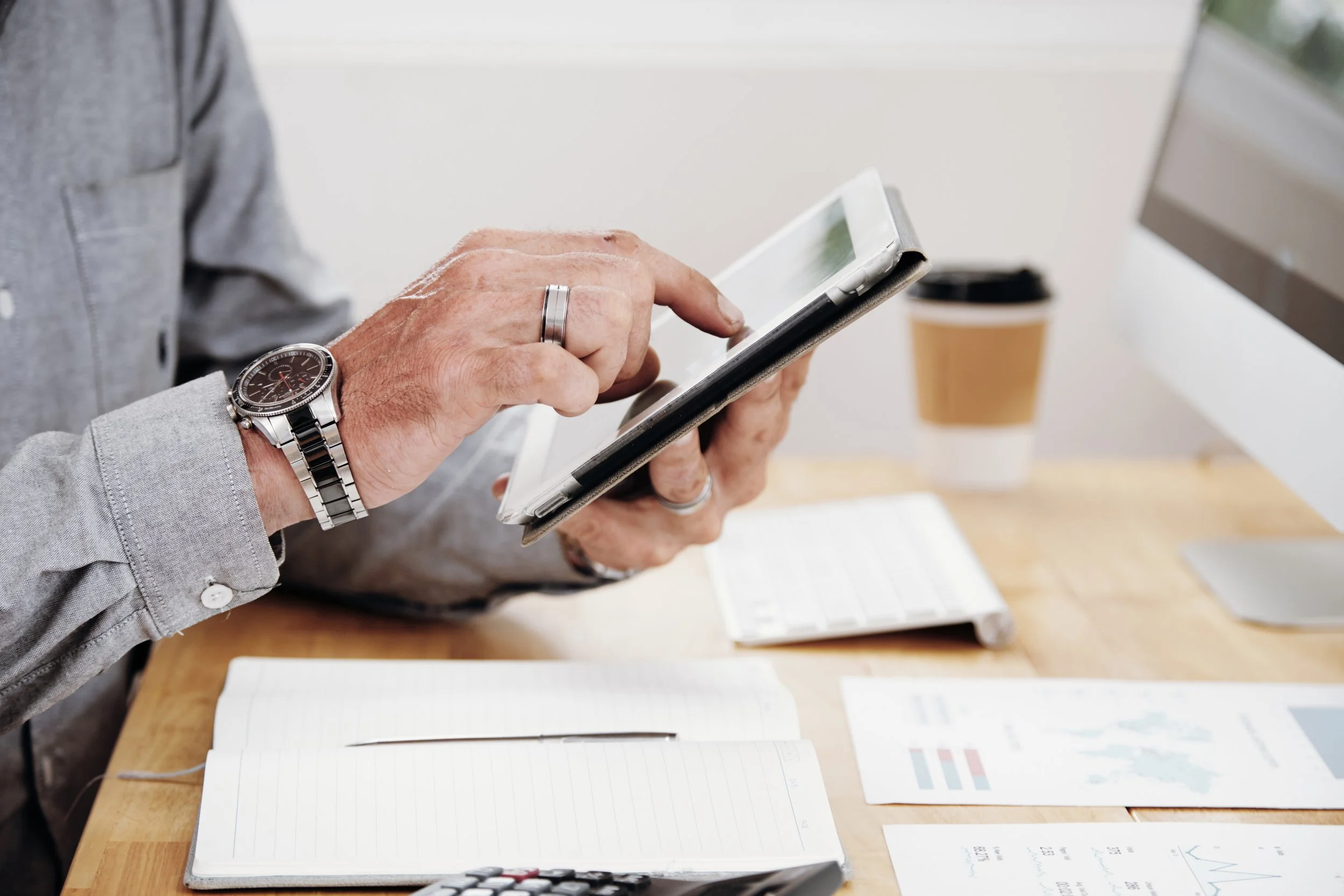 <a href="https://www.freepik.com/free-photo/man-using-tablet-pc_6850130.htm#fromView=search&page=1&position=15&uuid=c816d2d2-3beb-47cf-8fb1-86dd0a18c152&query=working+on+finances+phone">Image by pressfoto on Freepik</a>