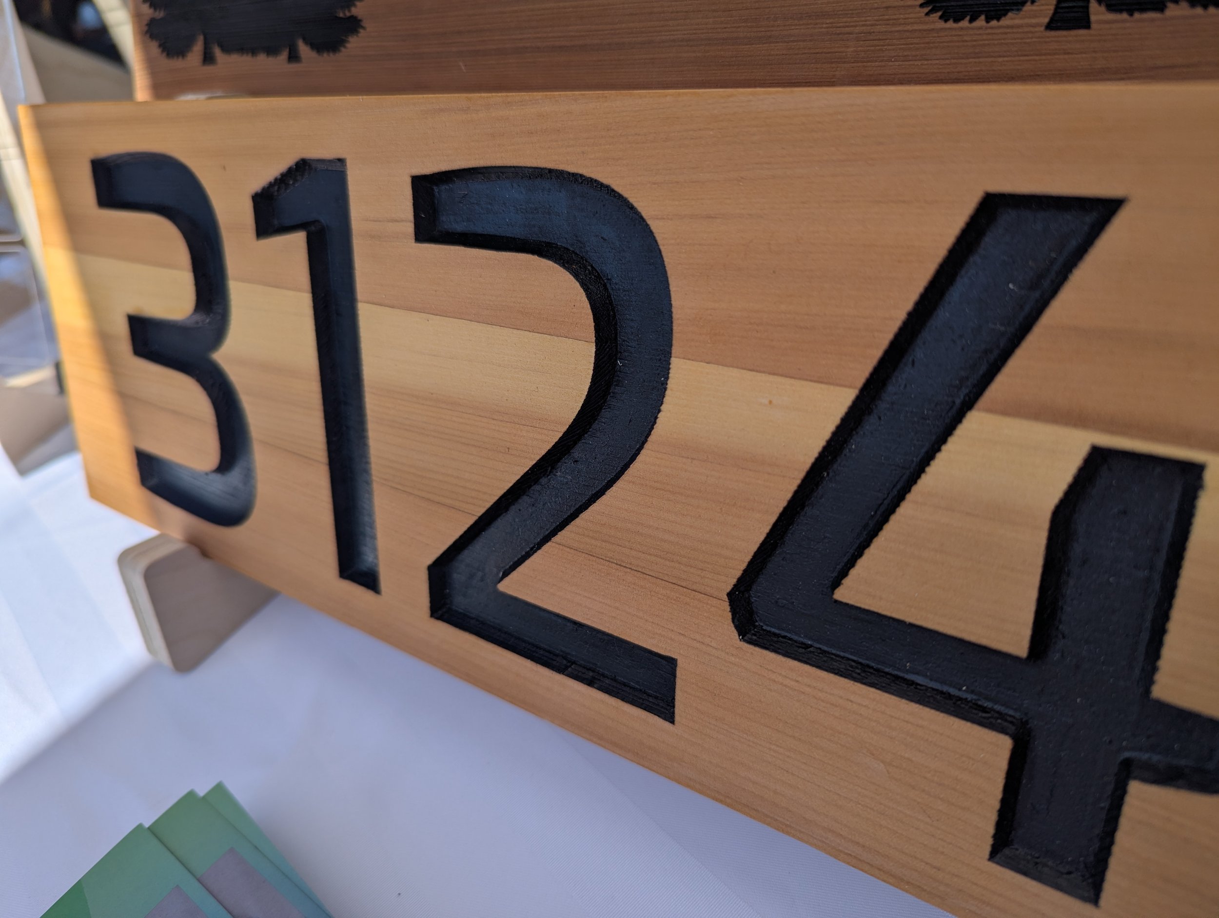 Cedar number sign with black lettering and exterior finish