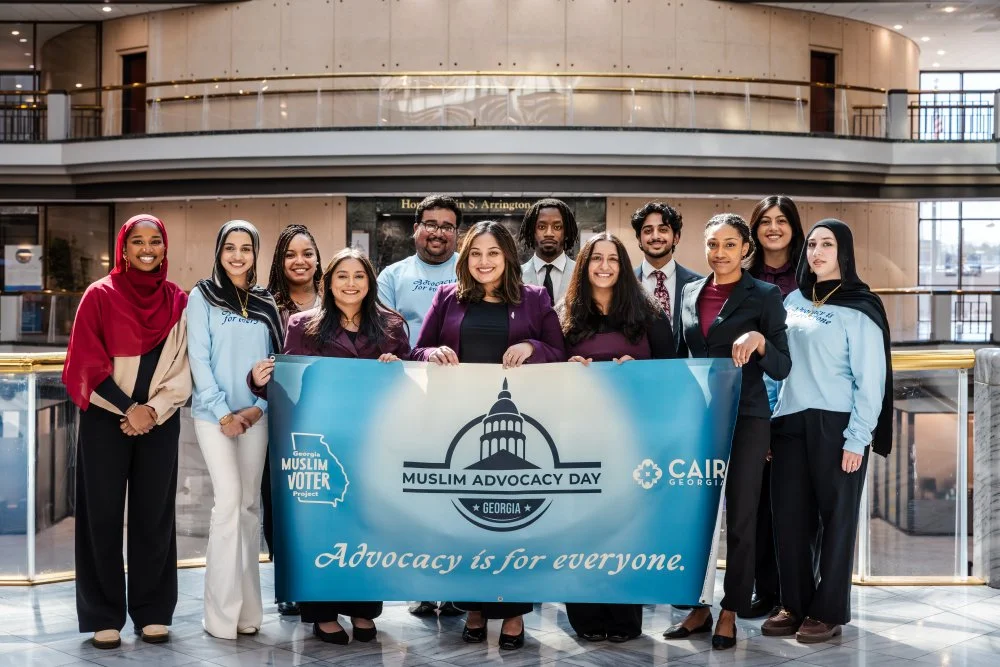 GAMVP staff poses on the steps inside the Georgia State Capitol