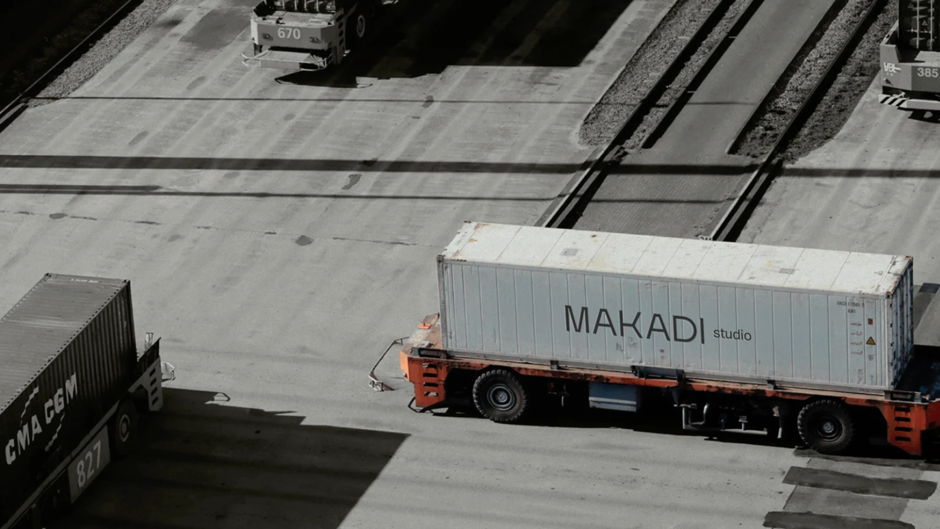 Makadi Studio branded shipping container on a truck