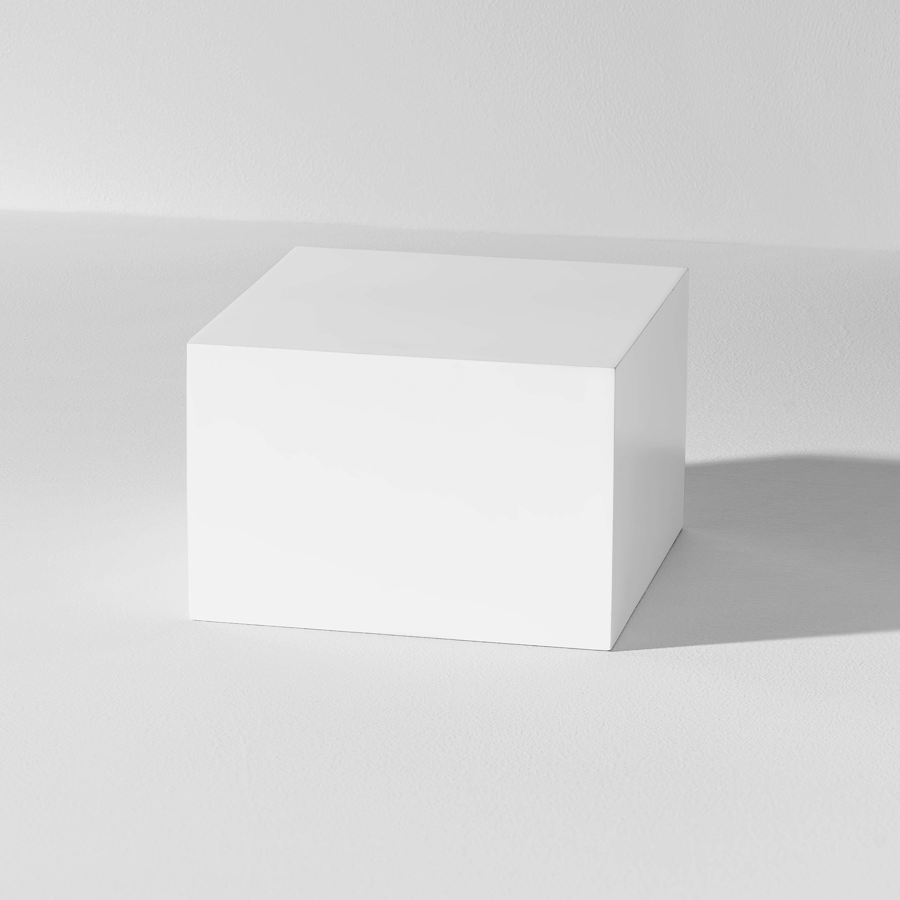 White product photography riser on a white background