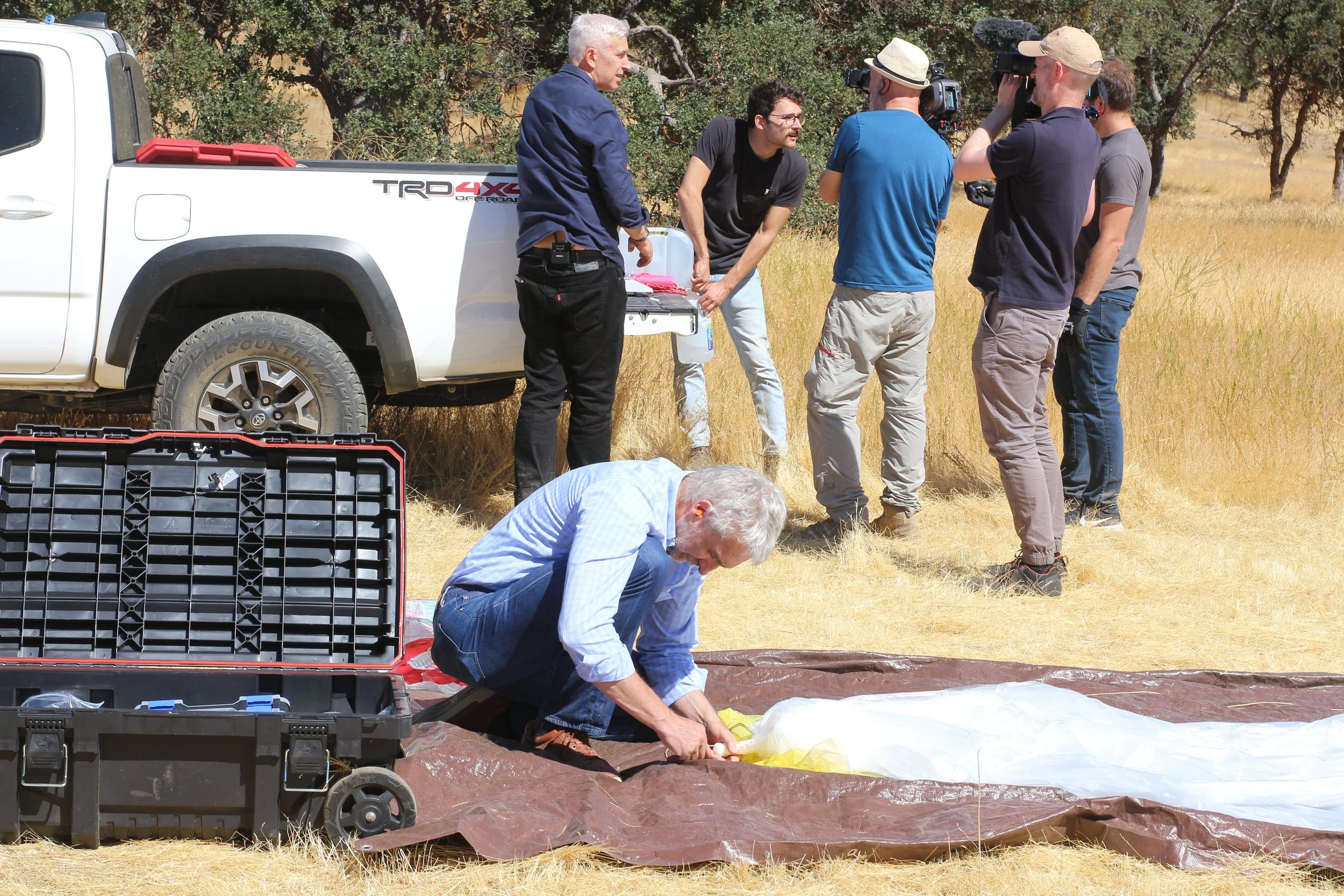 JF Holding Balloon on Ground, Camera Crew in Background (Landscape).JPG