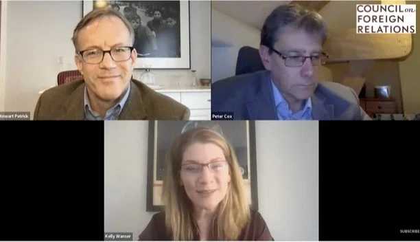 Screenshot of a virtual video conference with three participants: Stewart Patrick, Peter Cox, and Kelly Wansser, in separate frames. Stewart is wearing glasses and a brown blazer, Peter has glasses and a blue shirt, Kelly has long blonde hair and glasses.