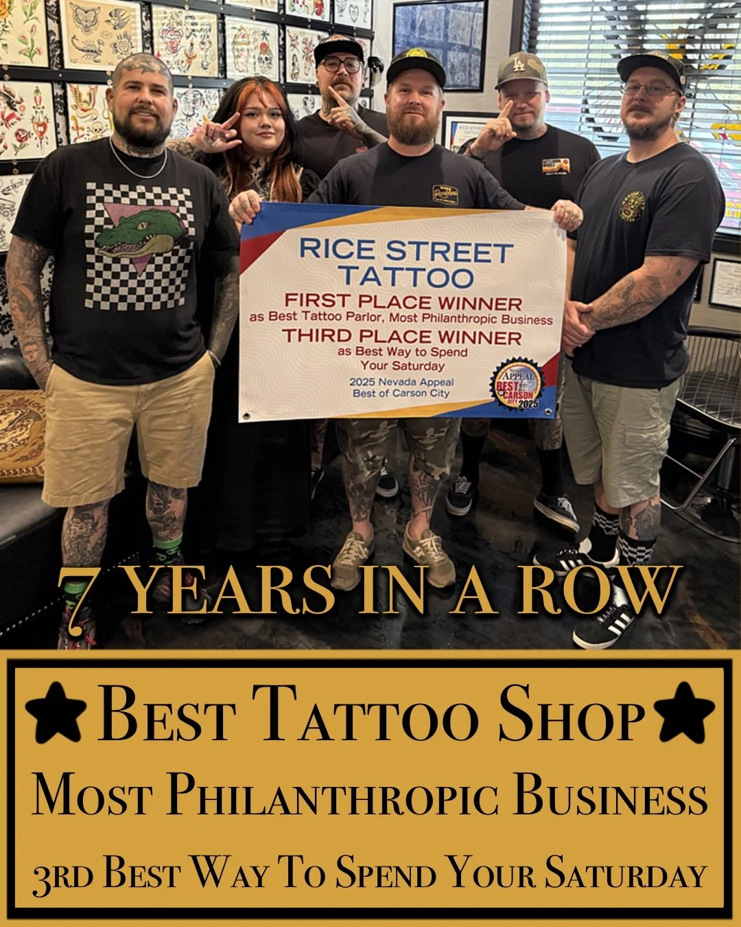 Group of six tattoo artists posing with a large award sign in a tattoo shop, celebrating their first and third place wins at the 2025 Nevada Appeal Best of Carson City. The shop's name is Rice Street Tattoo, and they are recognized as the best tattoo shop and most philanthropic business, with a notable achievement as the third best way to spend a Saturday