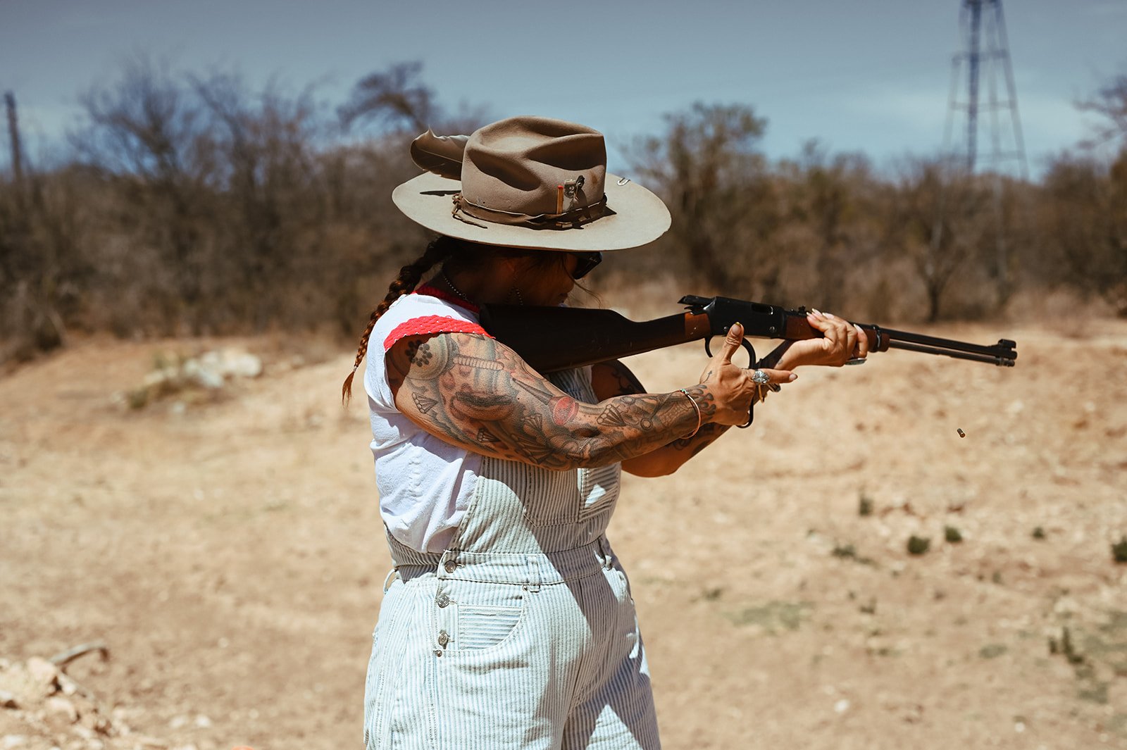 A dude ranch guest sport target shooting.