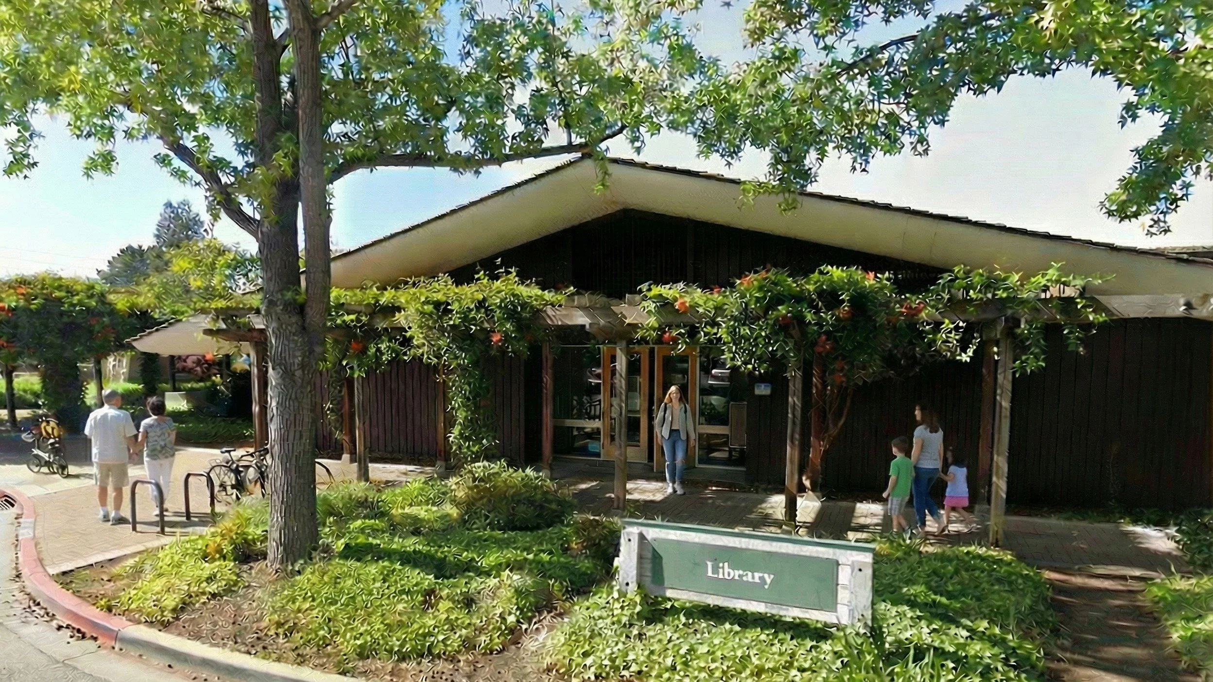 Exterior view of the Los Altos Library with trees and landscaping, showing people walking, biking, and entering the building.