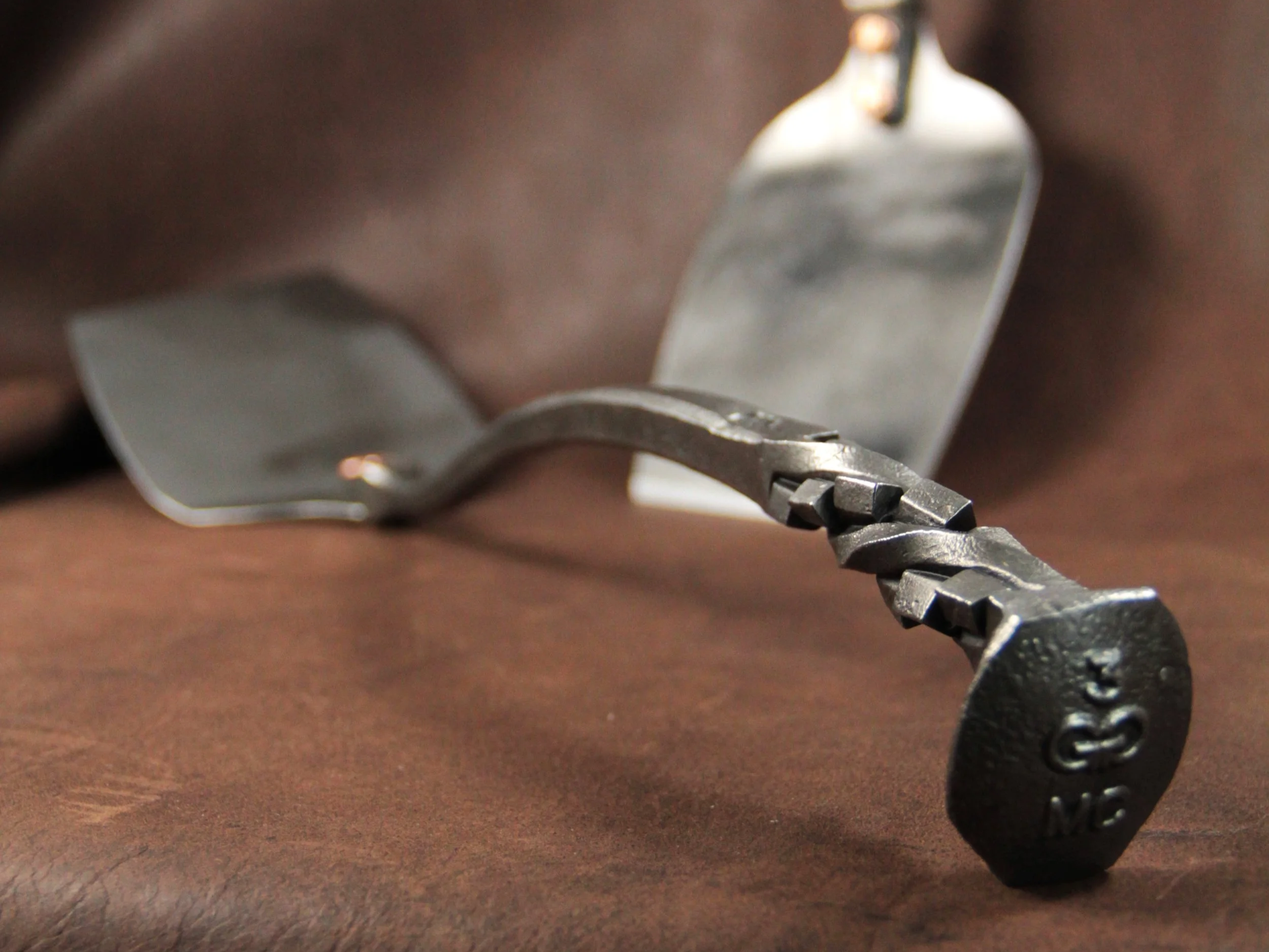 Our railroad spike spatulas have extra-long handles, making them excellent at keeping your hadns back from the flames