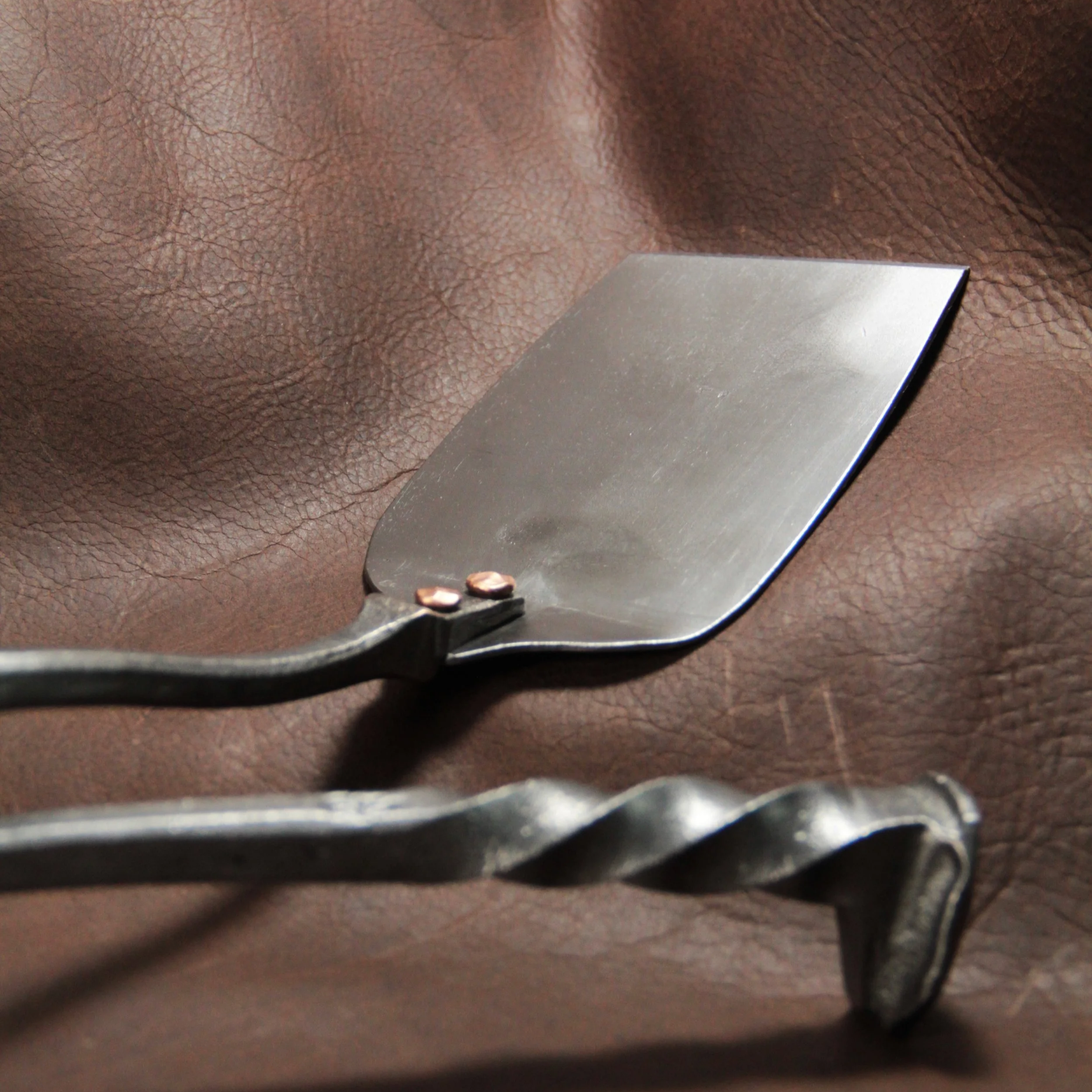 Our railroad spike spatulas are equipped with a stainless steel blade to enhance the usability