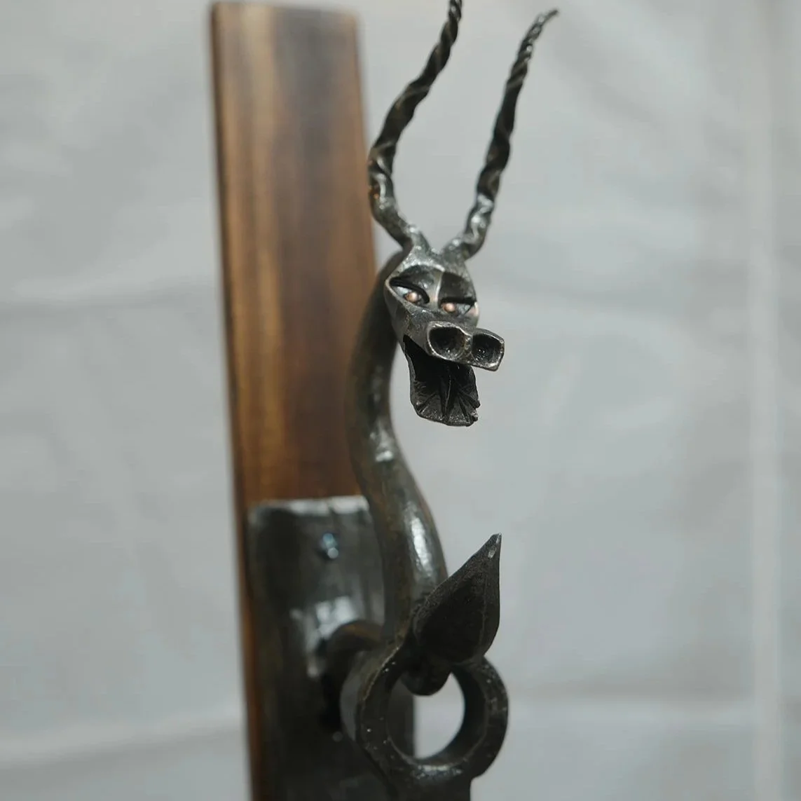 Custom forged metal dragon fire poker as a bit of a hint as to the topic of our next video. We are happy to provide some of the best custom forgings to our clients.