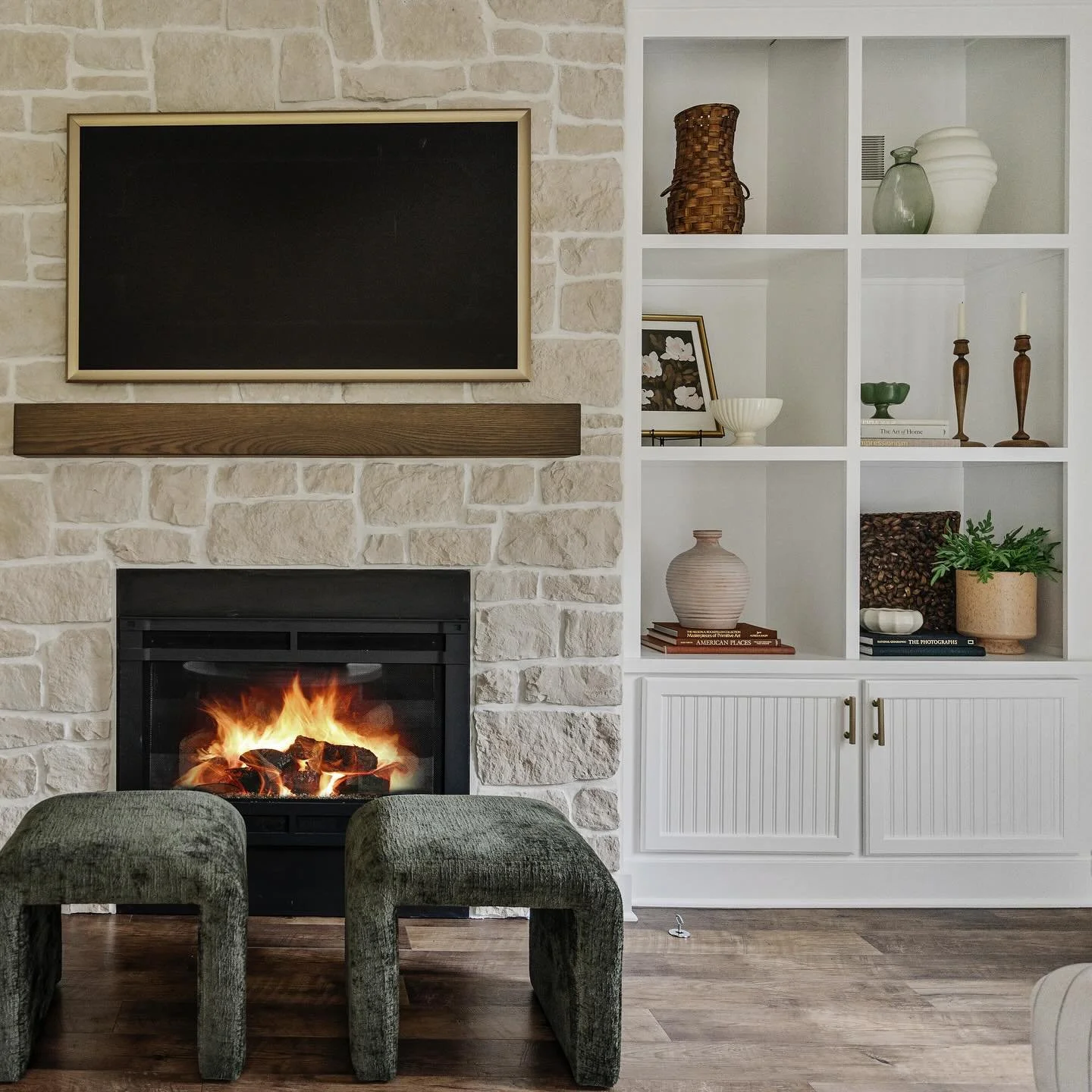 One last post about one of my favorite design projects to date! This fireplace finish was all my clients - I absolutely love the lime wash treatment they chose to update the stone. The built-ins were so fun for me to style and we added dimension and 