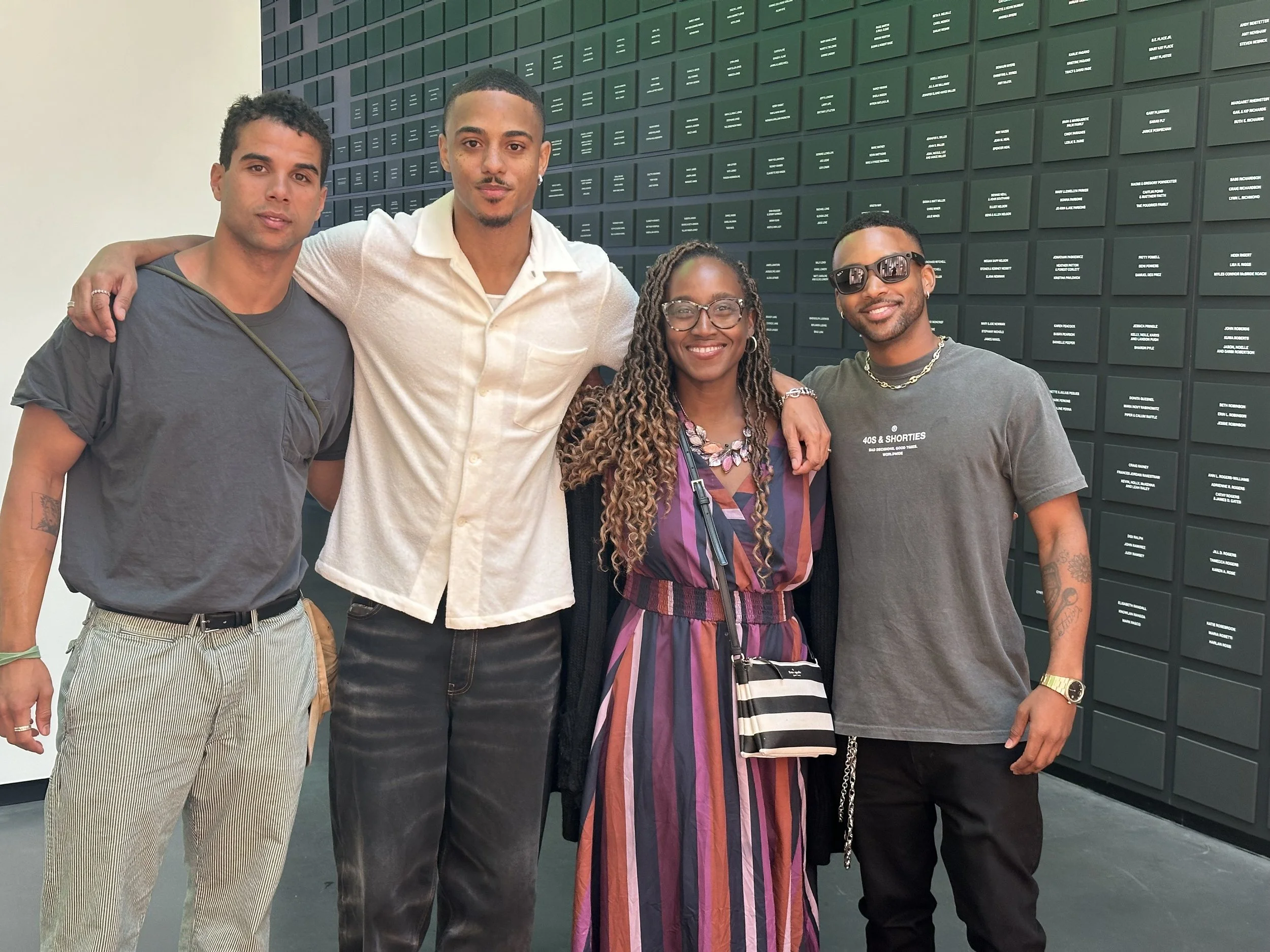 Kamala and some the cast in front of the Greenwood Rising Museum in Tulsa, OK