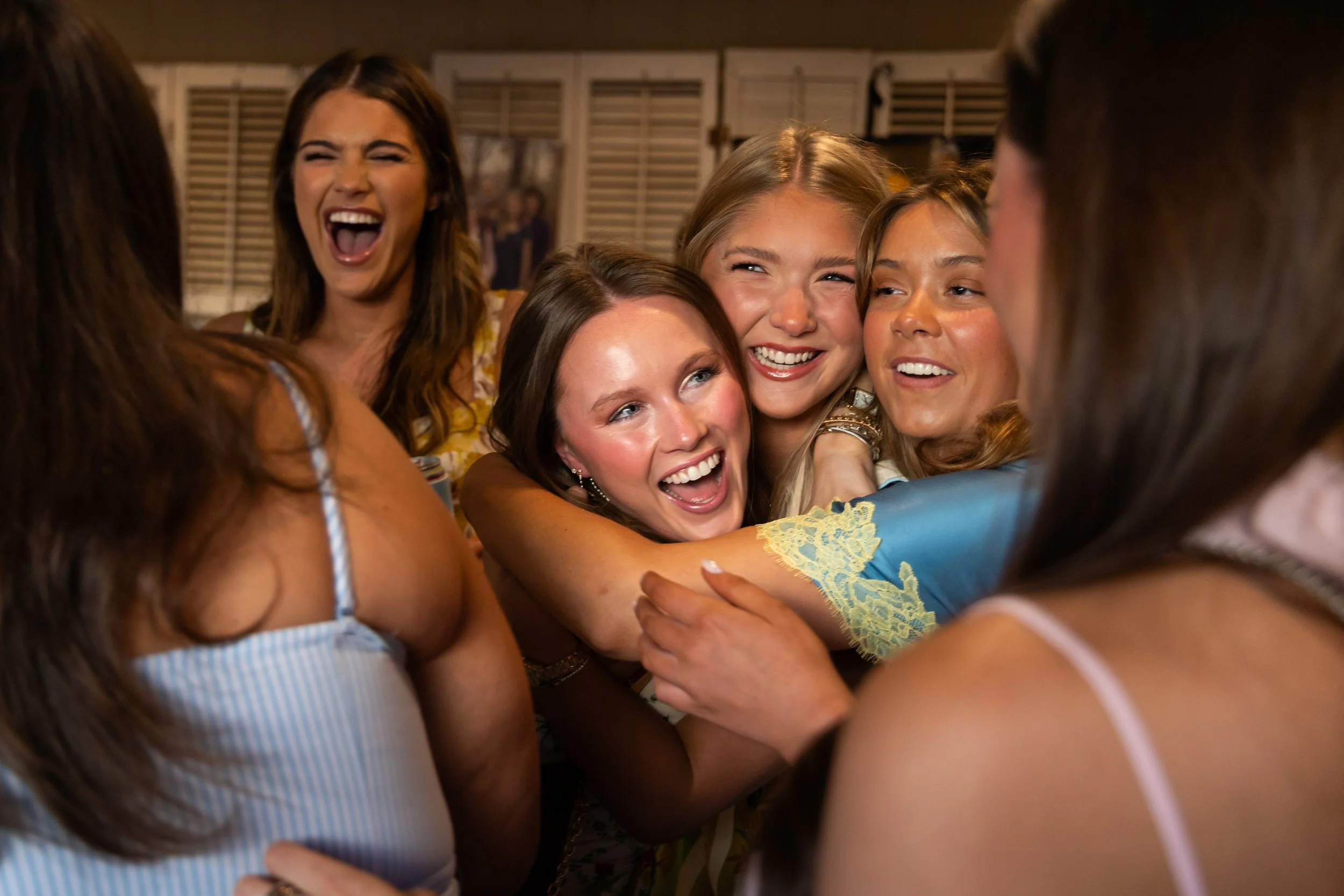 Friends celebrating a newly engaged friend at an engagement party in Oxford, MS on May 9, 2026.
