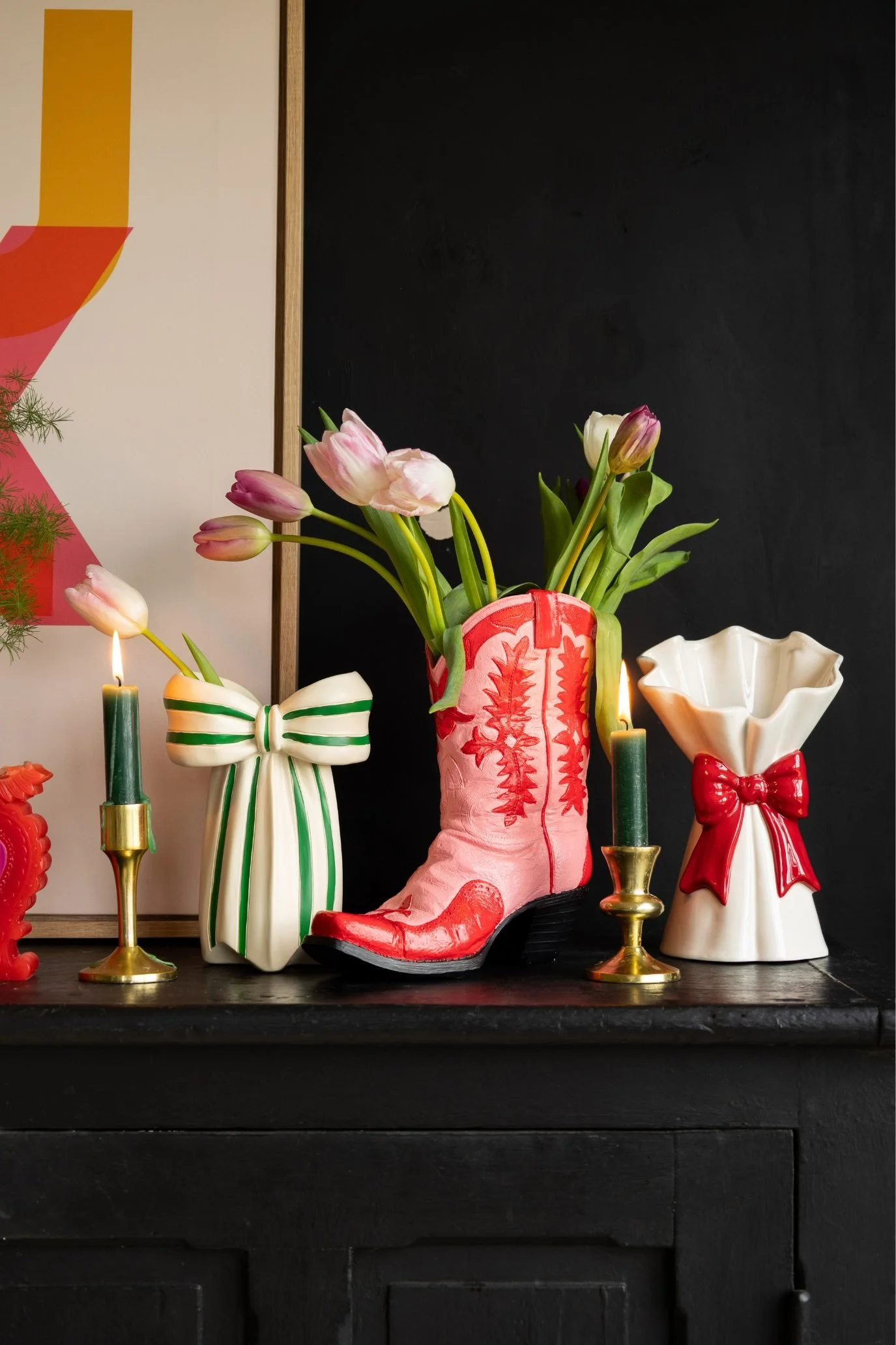 Decorative cowboy boot-shaped vase with colourful Western-inspired detailing.