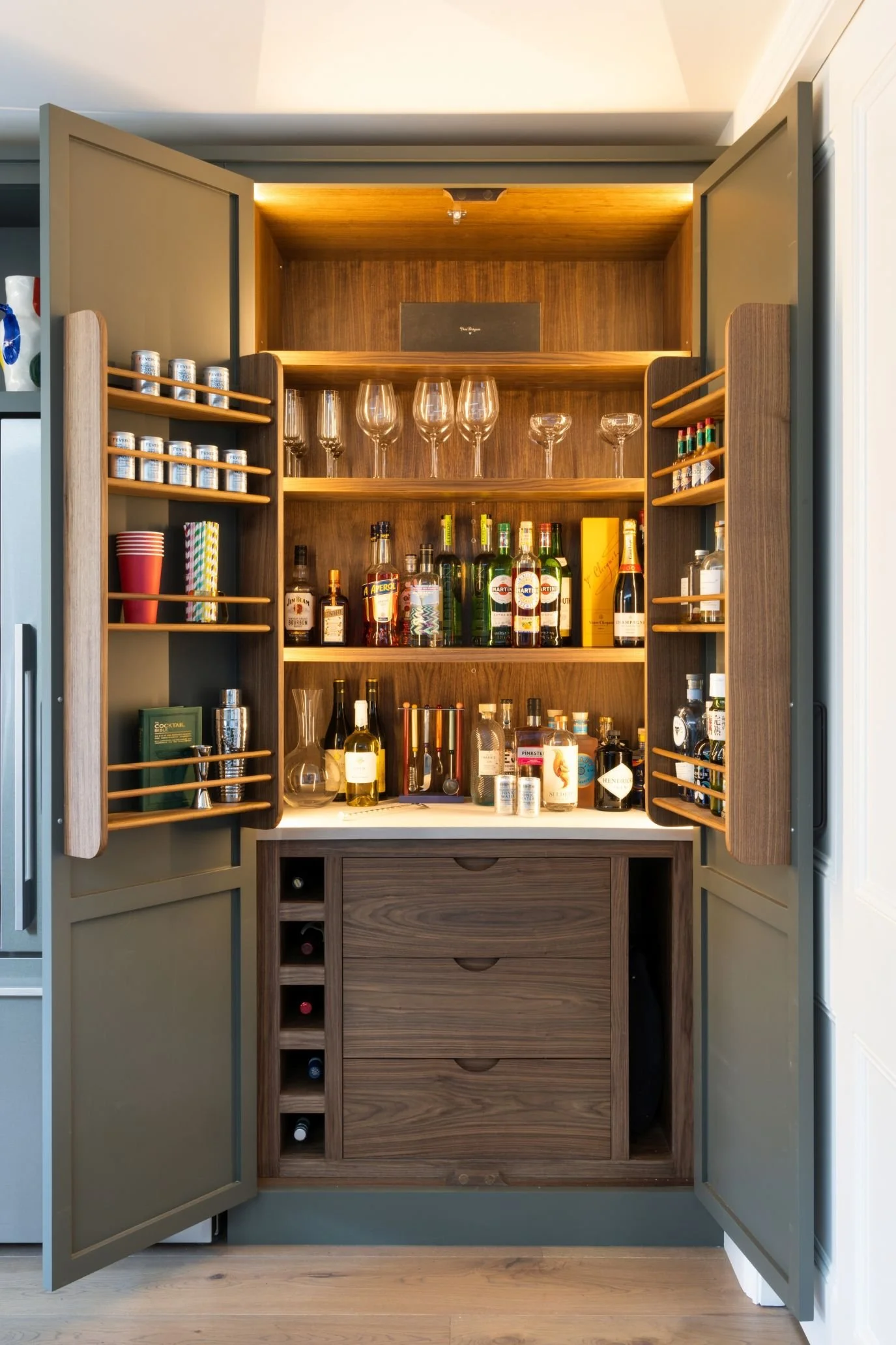 Built-in drinks cabinet integrated into kitchen cabinetry