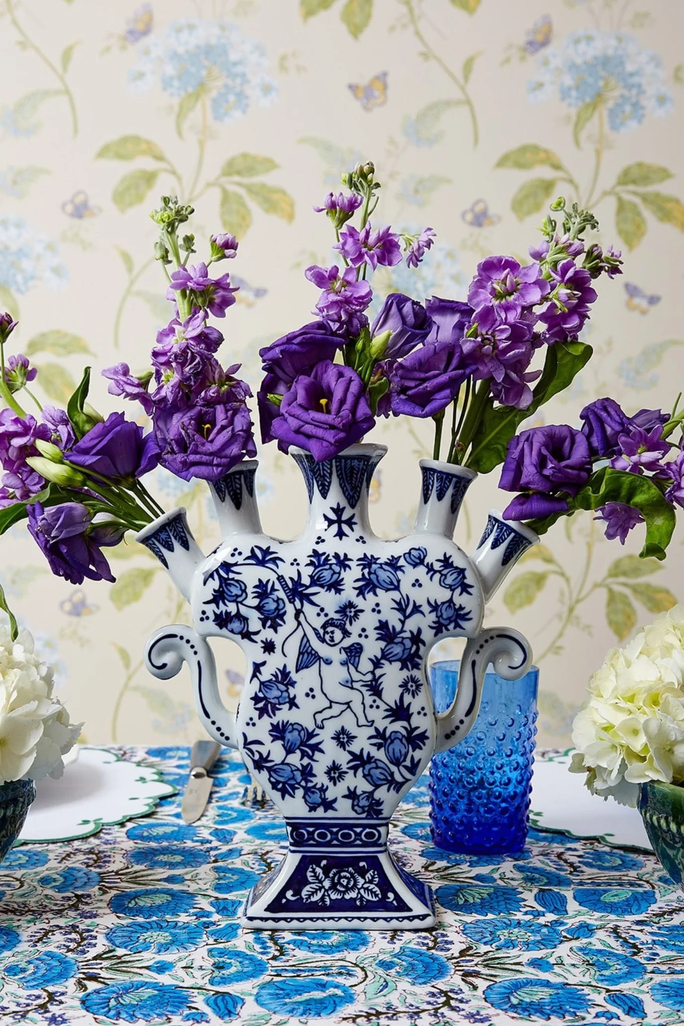 Blue and white five-pronged Delft-style tulipière with hand-painted decoration.
