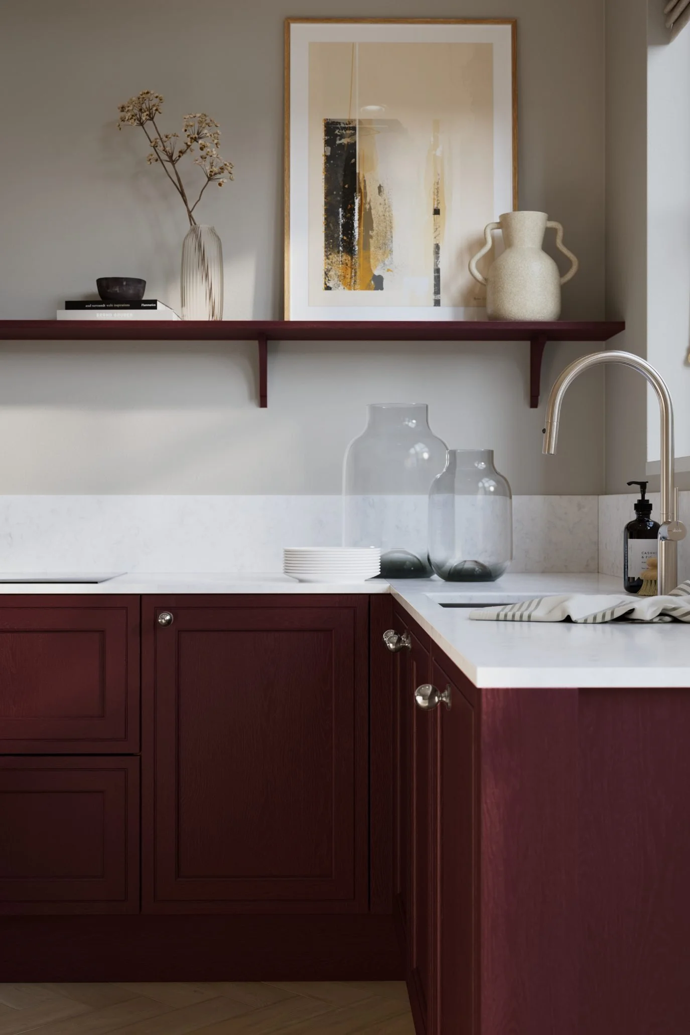 Kitchen cabinetry painted in a rich wine-red shade with matching open shelving and contrasting light surfaces.