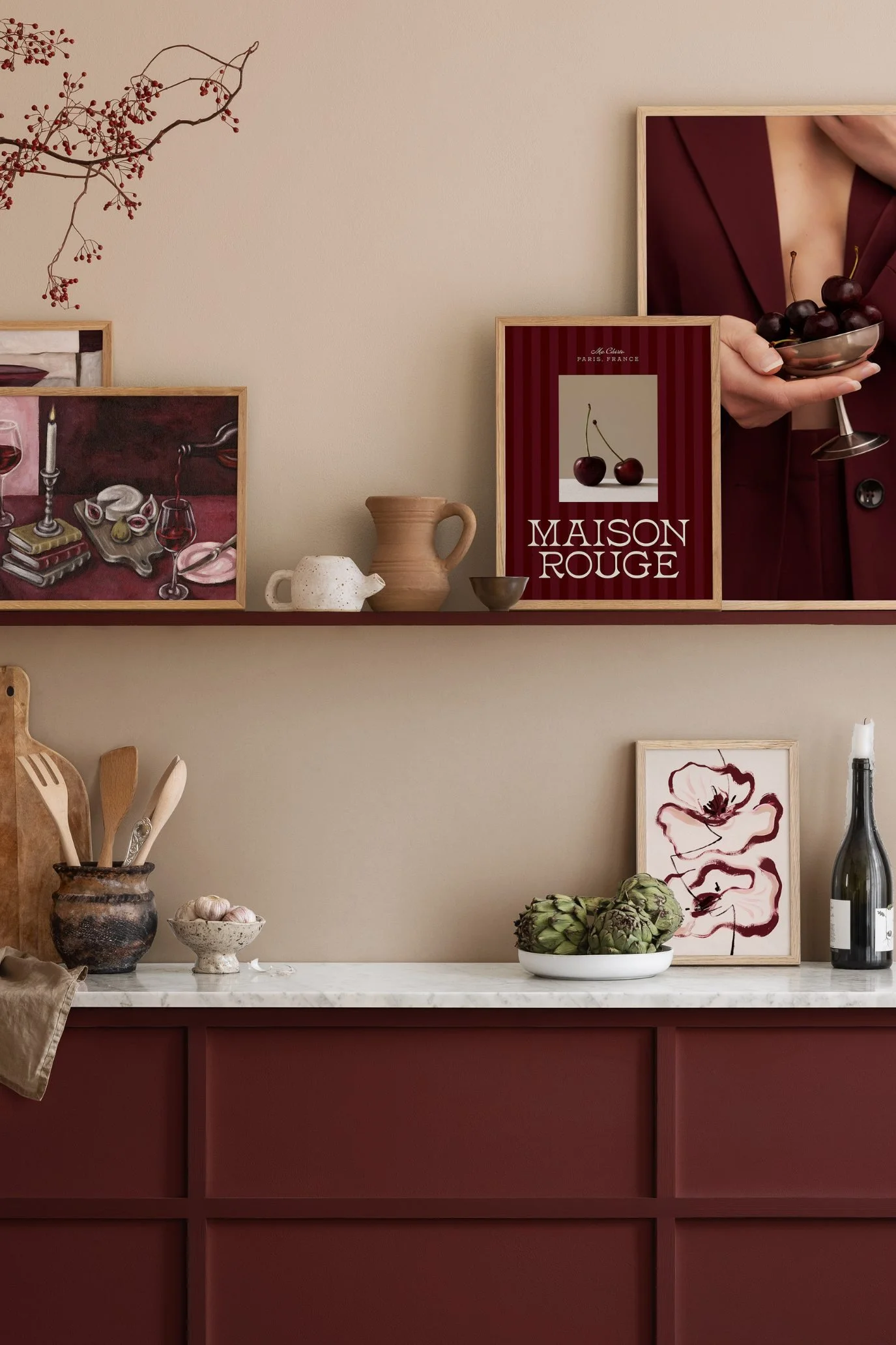 Burgundy wine-themed Desenio prints styled on kitchen shelving as an easy way to introduce deep red.
