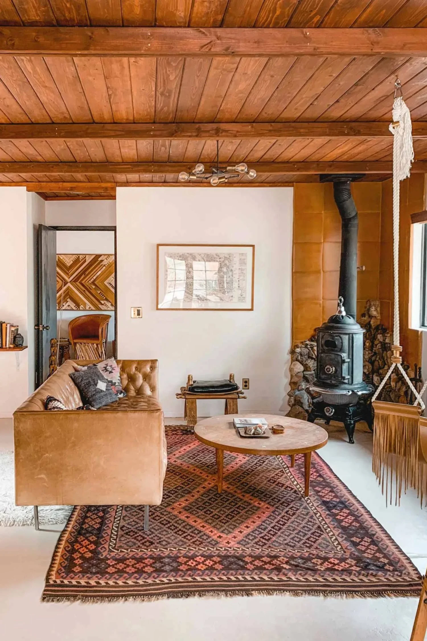Desert-inspired living space at The Joshua Tree House with earthy tones, natural textures and relaxed bohemian styling.