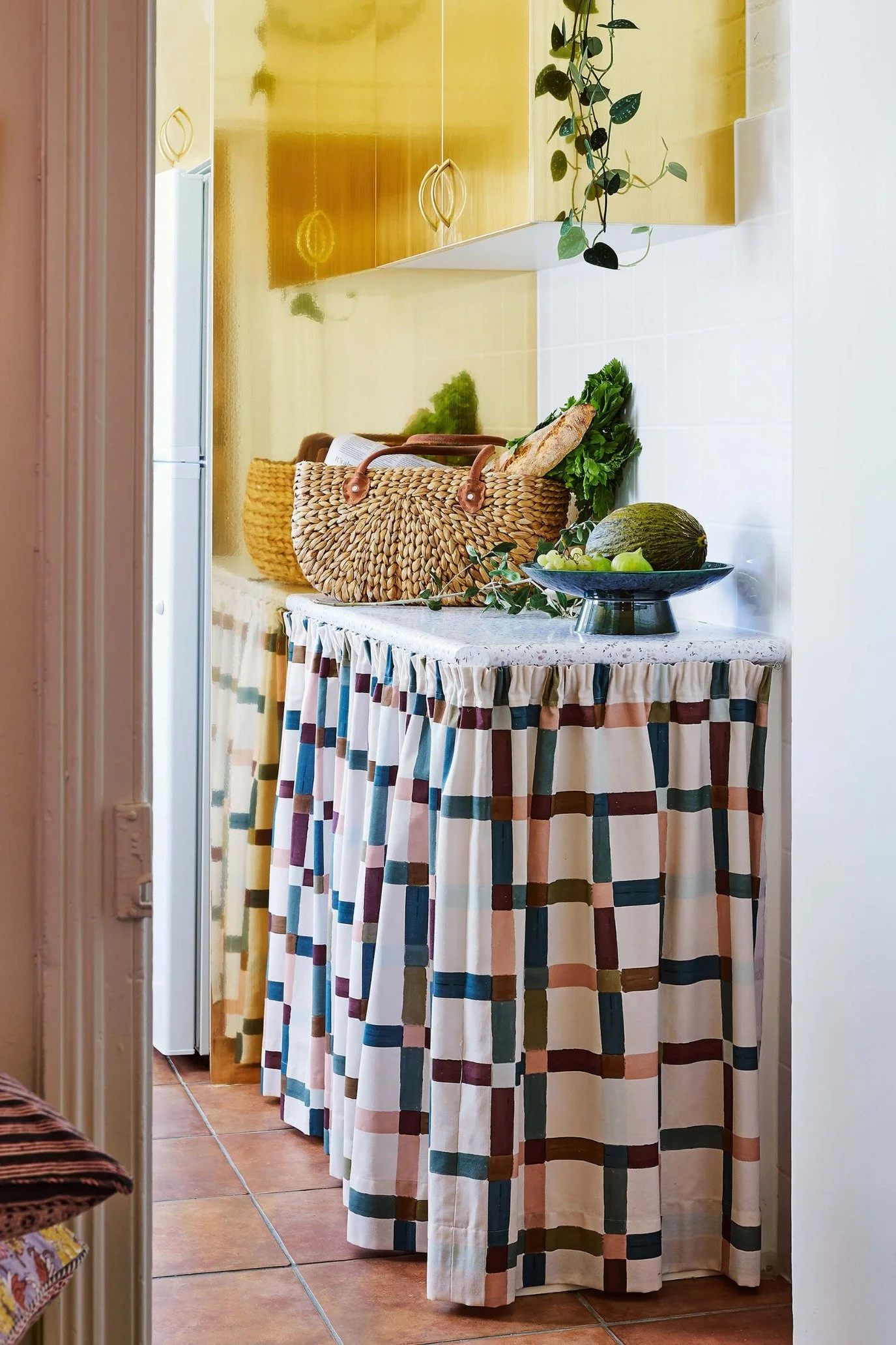 Colourful artist-inspired living room in Melbourne with eclectic decor, vintage furniture and layered textures.