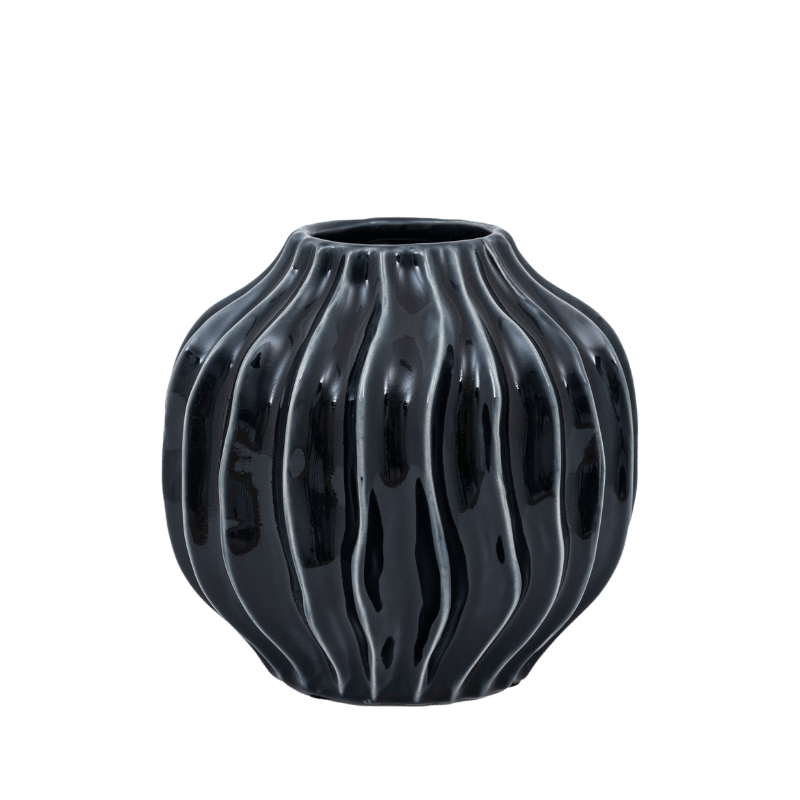 A small black pot with white uneven stripes