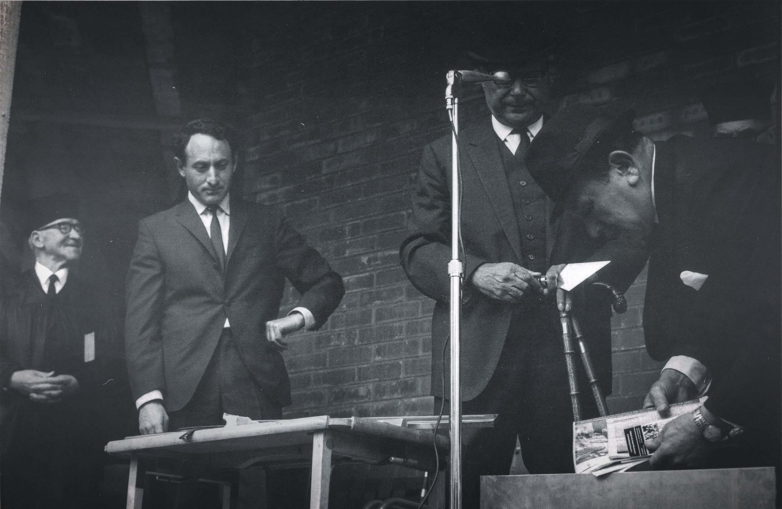  Mr E.I. Barnett, placing items of interest in the Time Capsule. John Goldwater and L.D. Nathan also pictured.  (Source: HaShofar, Nov 1967, Vol 9, No. 8). 