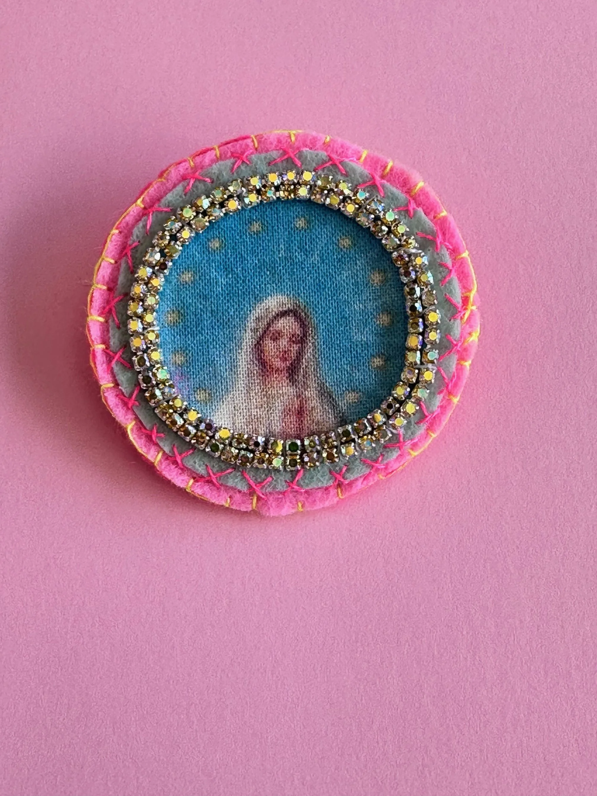 Mary brooch, cotton on felt