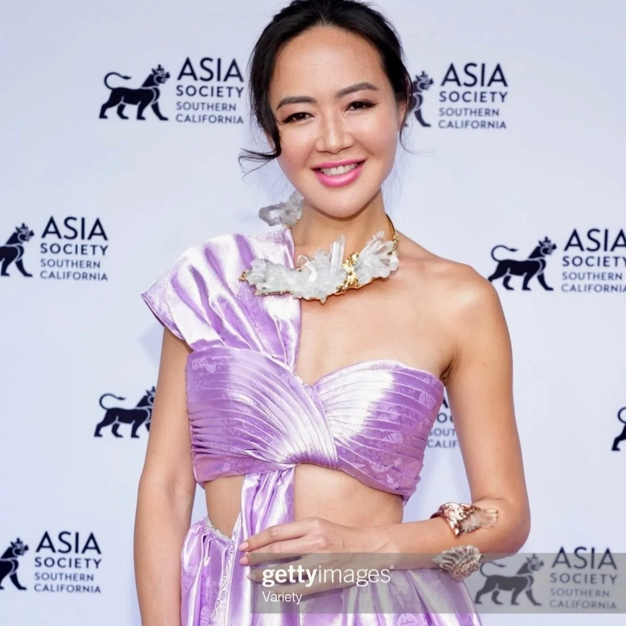 Angel Pai in Illumin crystal neck cuff and carved wing quartz arm cuff