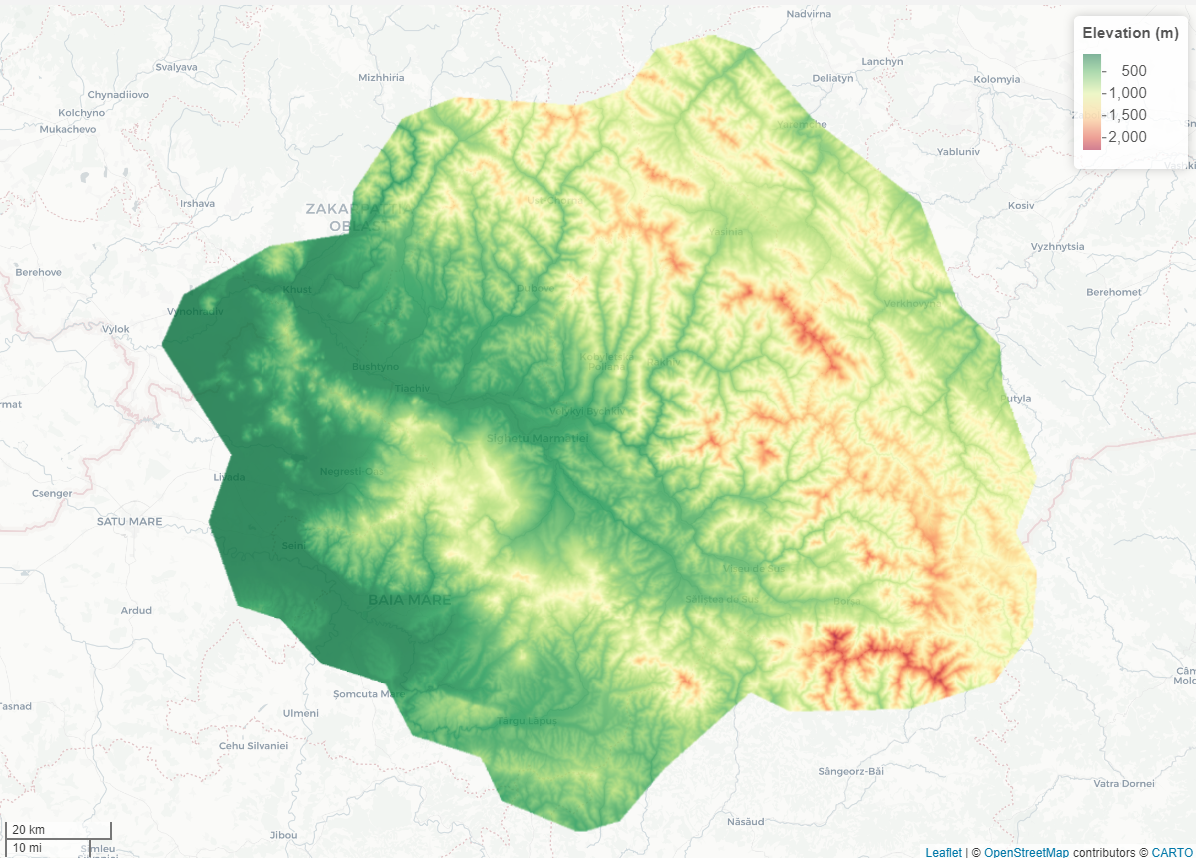 Topographic elevation map of a region in Eastern Europe, showing varying elevation levels with green, yellow, and red colors. Includes geographic locations like Satu Mare, Baia Mare, and Vynohradiv. Elevation key indicates levels from 500 to 2,000 meters.