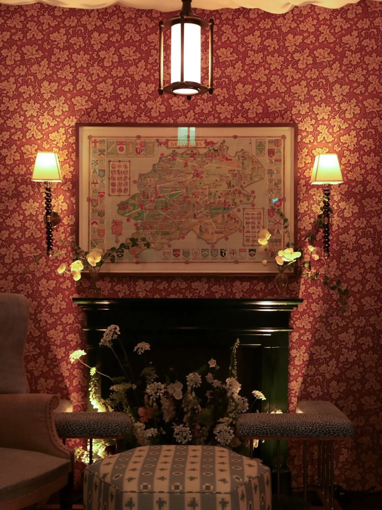 The @notswolds stand looking smashing for the first day of @bada1918 fair. The Chapel Lantern I designed in the centre, my Barley Twist wall lights either side of the fireplace, and our new uplights lighting the fire surround. All now available to pu