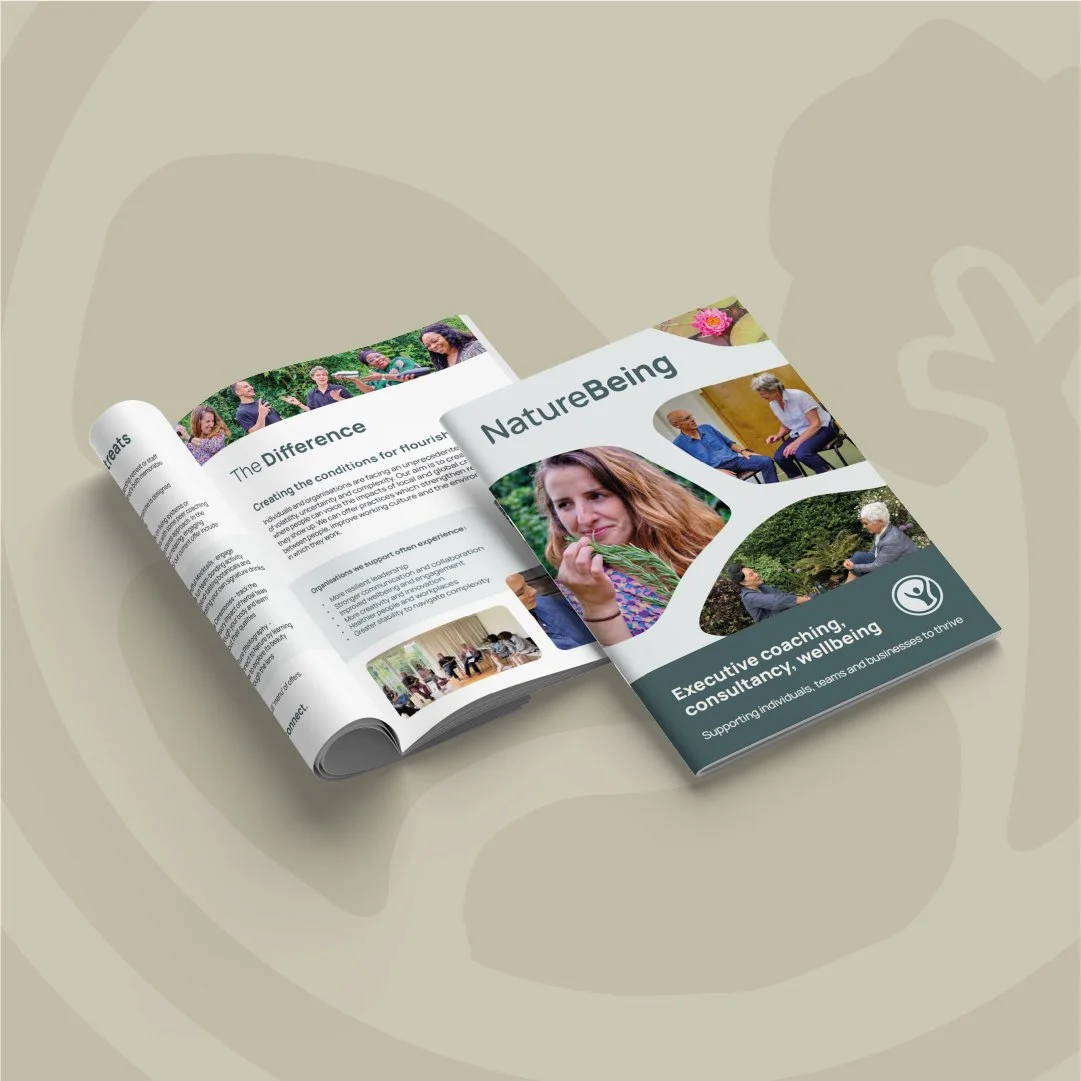 Soft green background with tree pattern and a brochure mockup for NatureBeing showing images of humans in nature