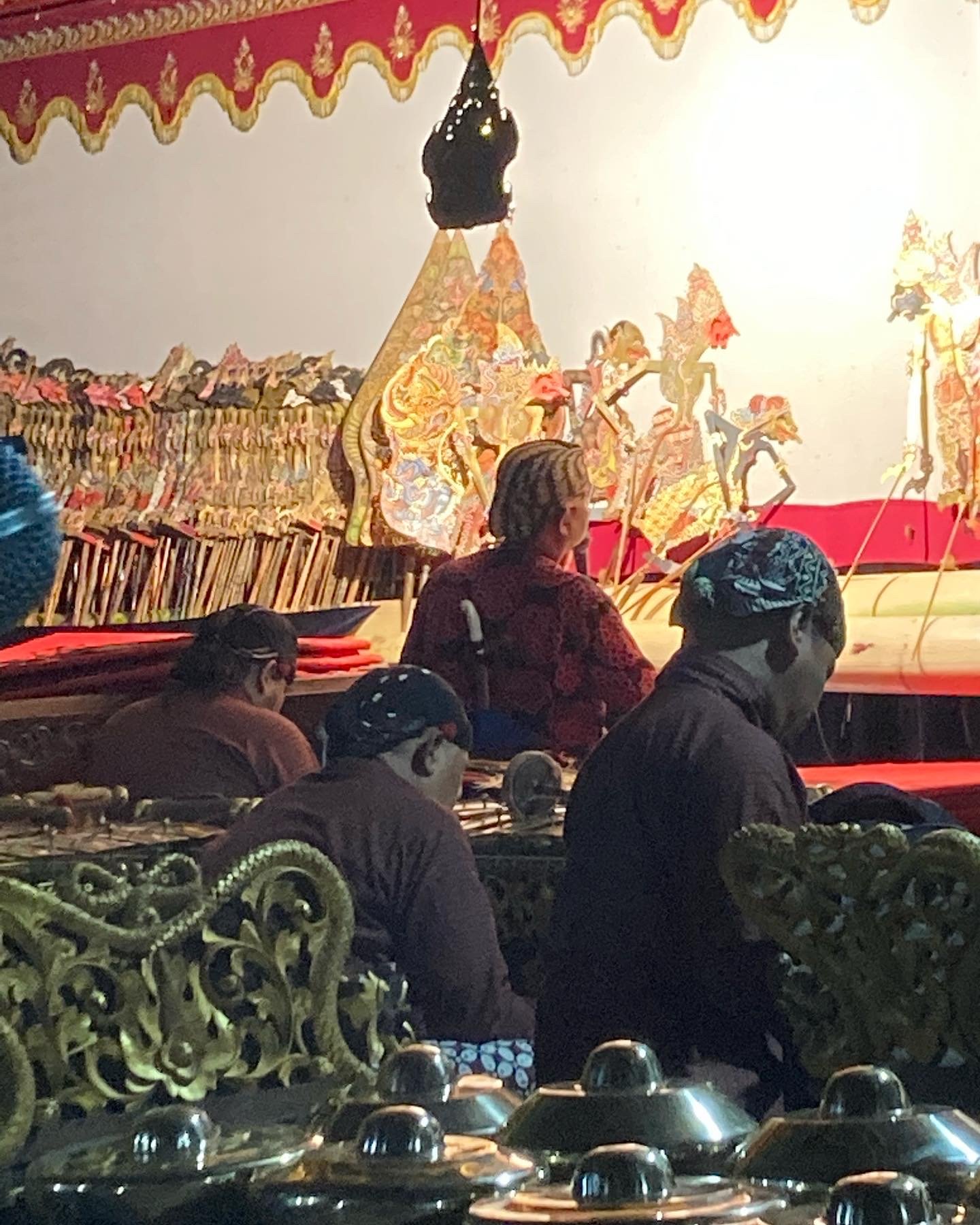 Behind the dalang and gamelan