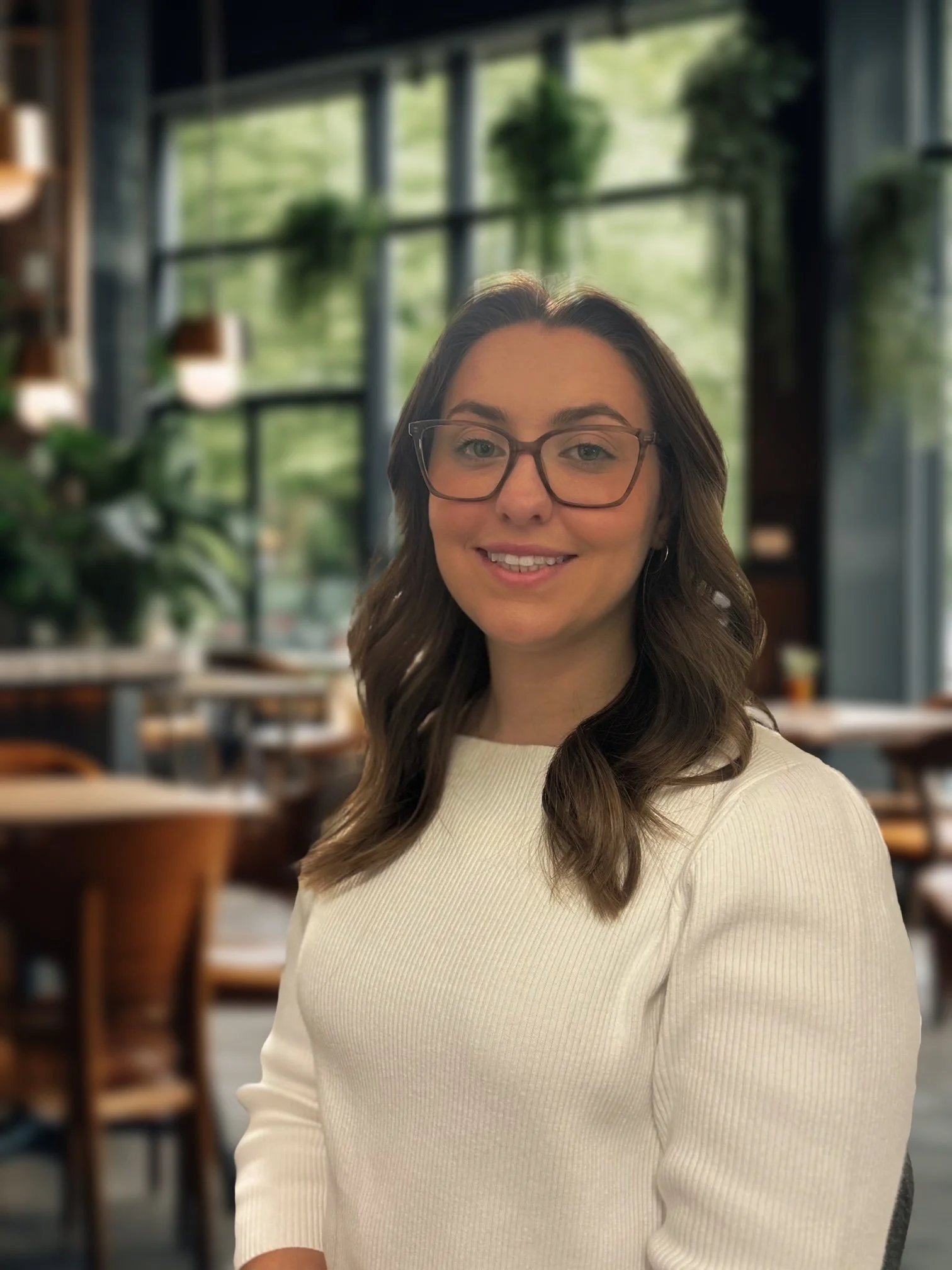 Victoria, wedding dog attendant with Black Dog Weddings, providing dog care during a wedding day.