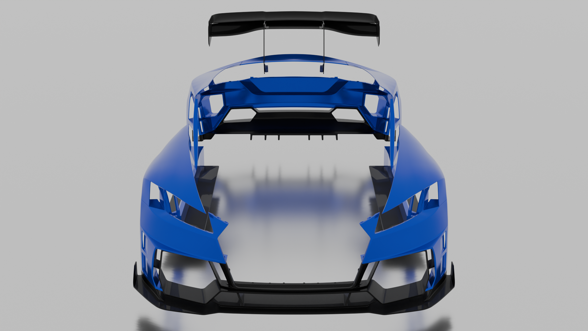 Front view of a blue race car body shell with aerodynamic features and black accents.