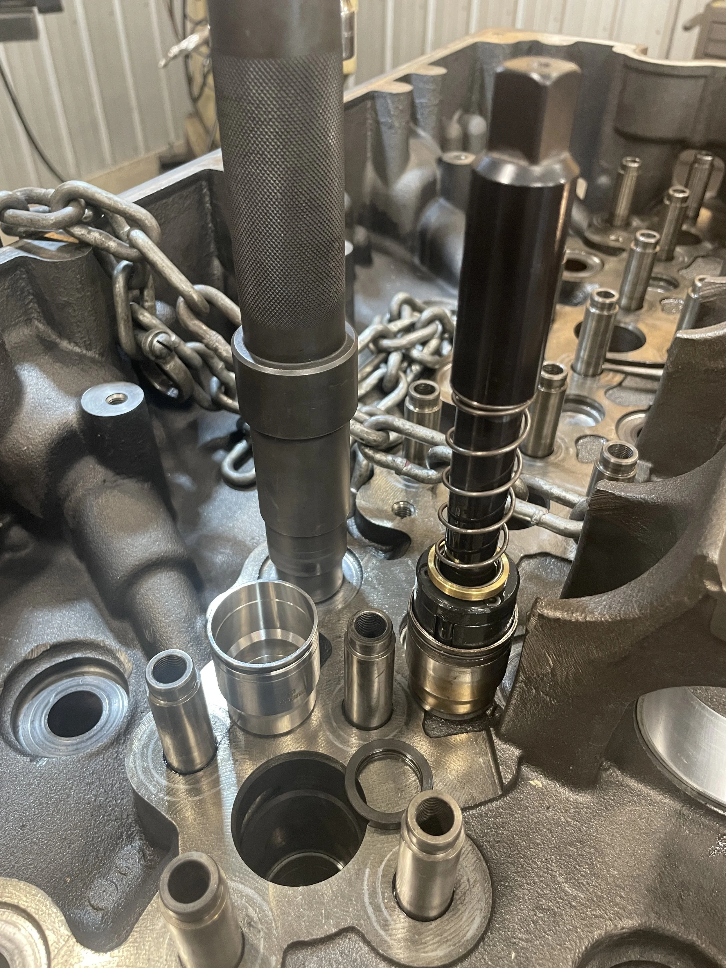 Cummins ISX SOHC single overhead cam injector sleeve tube cup replacement with Ferrum tooling