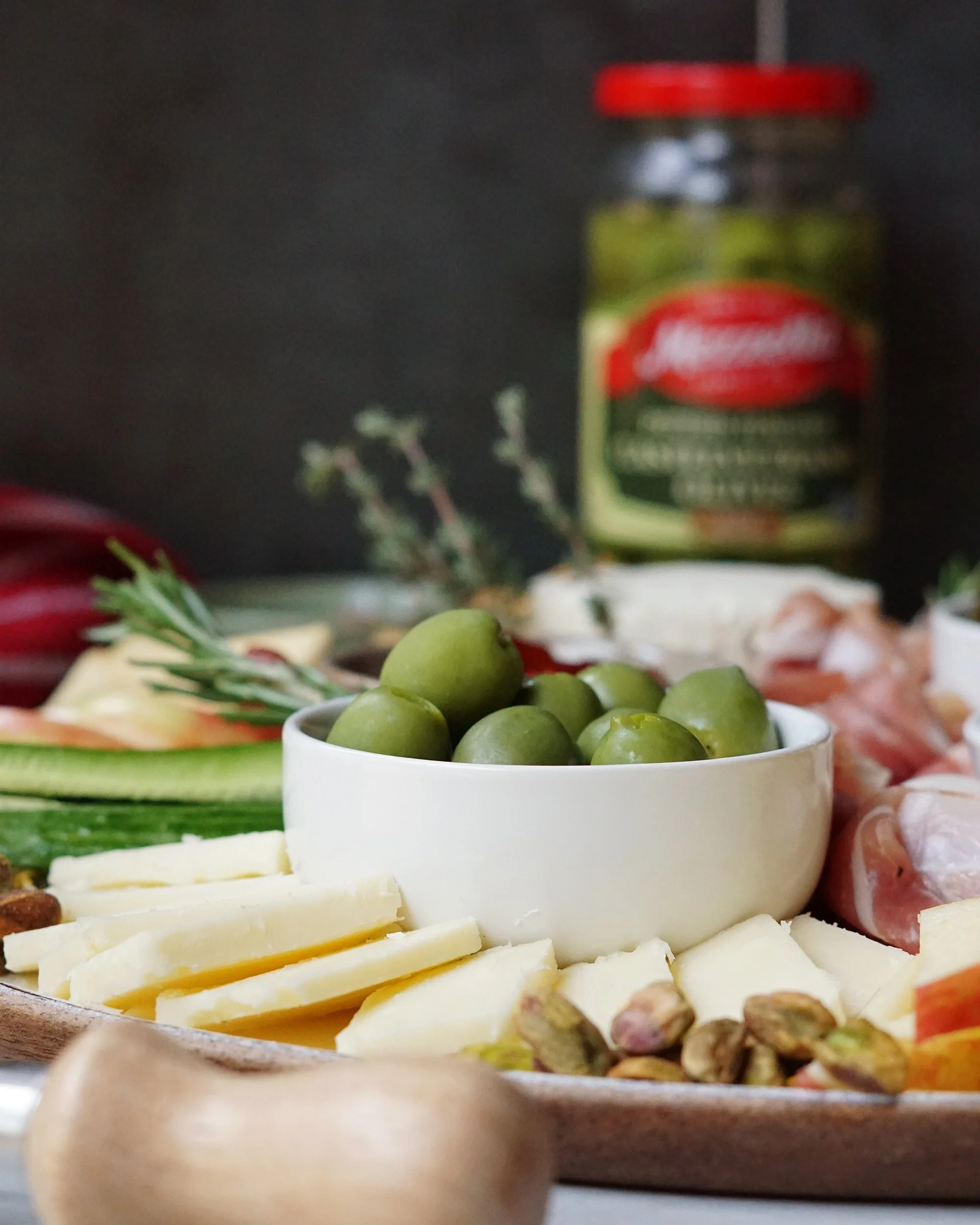 Photo of a charcuterie board featuring Mezzetta olives taken by Melanie Richtman