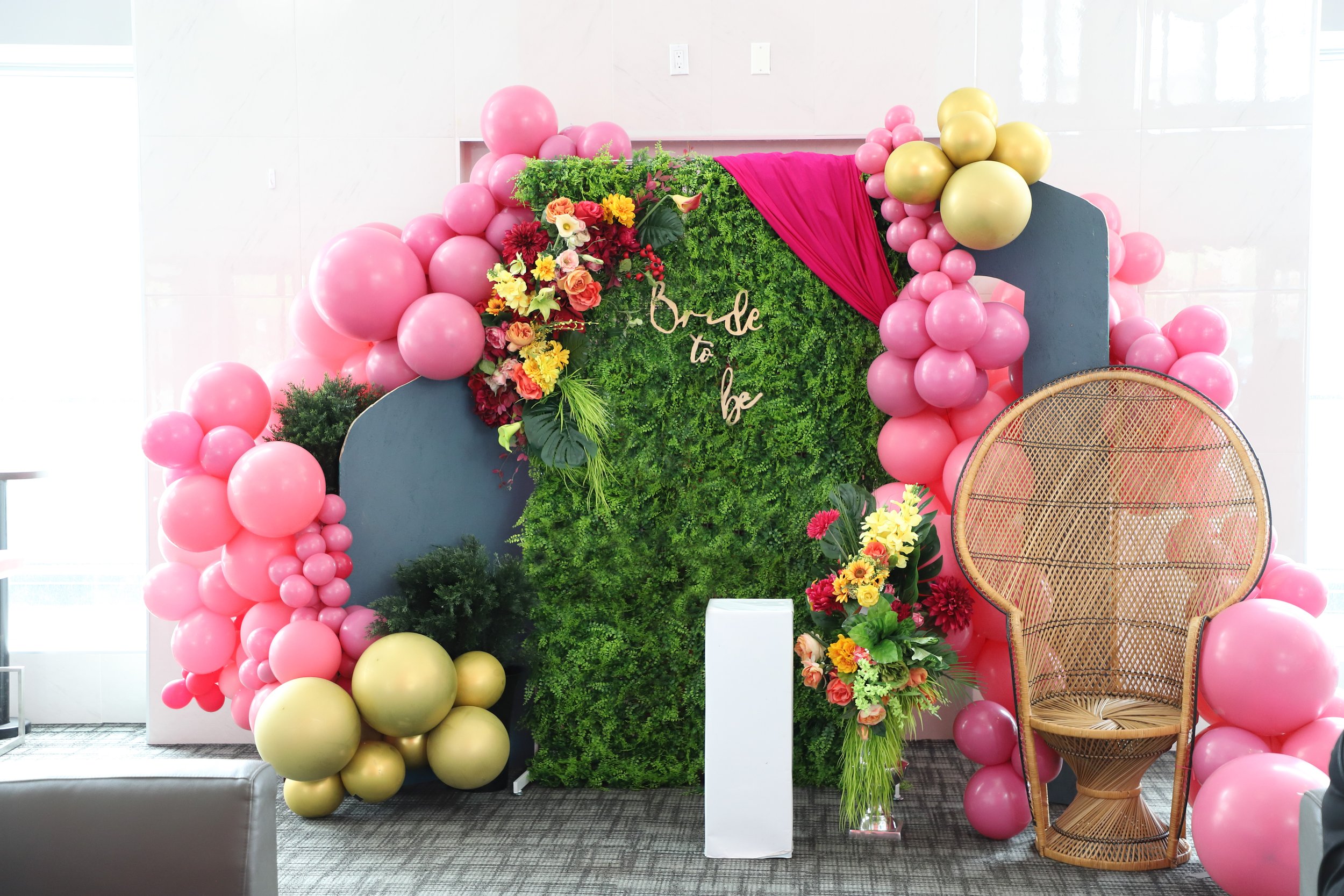 Bridal shower with tropical colours backdrop.jpg