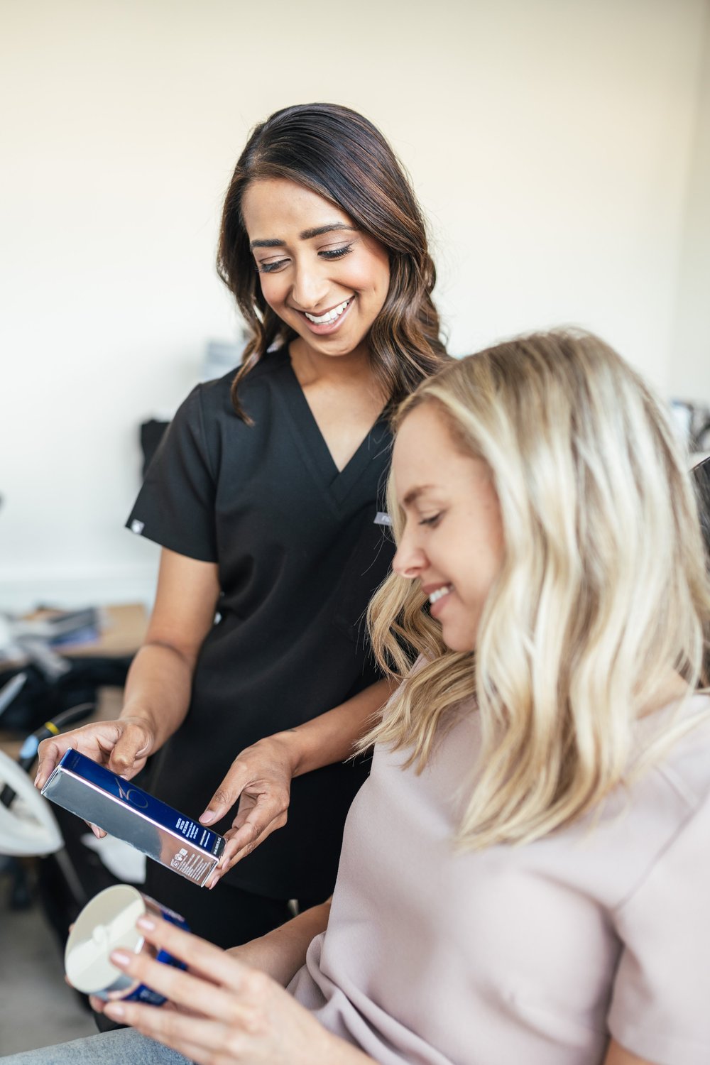 Dr Tajel Patel speaking with a patient during a consultation