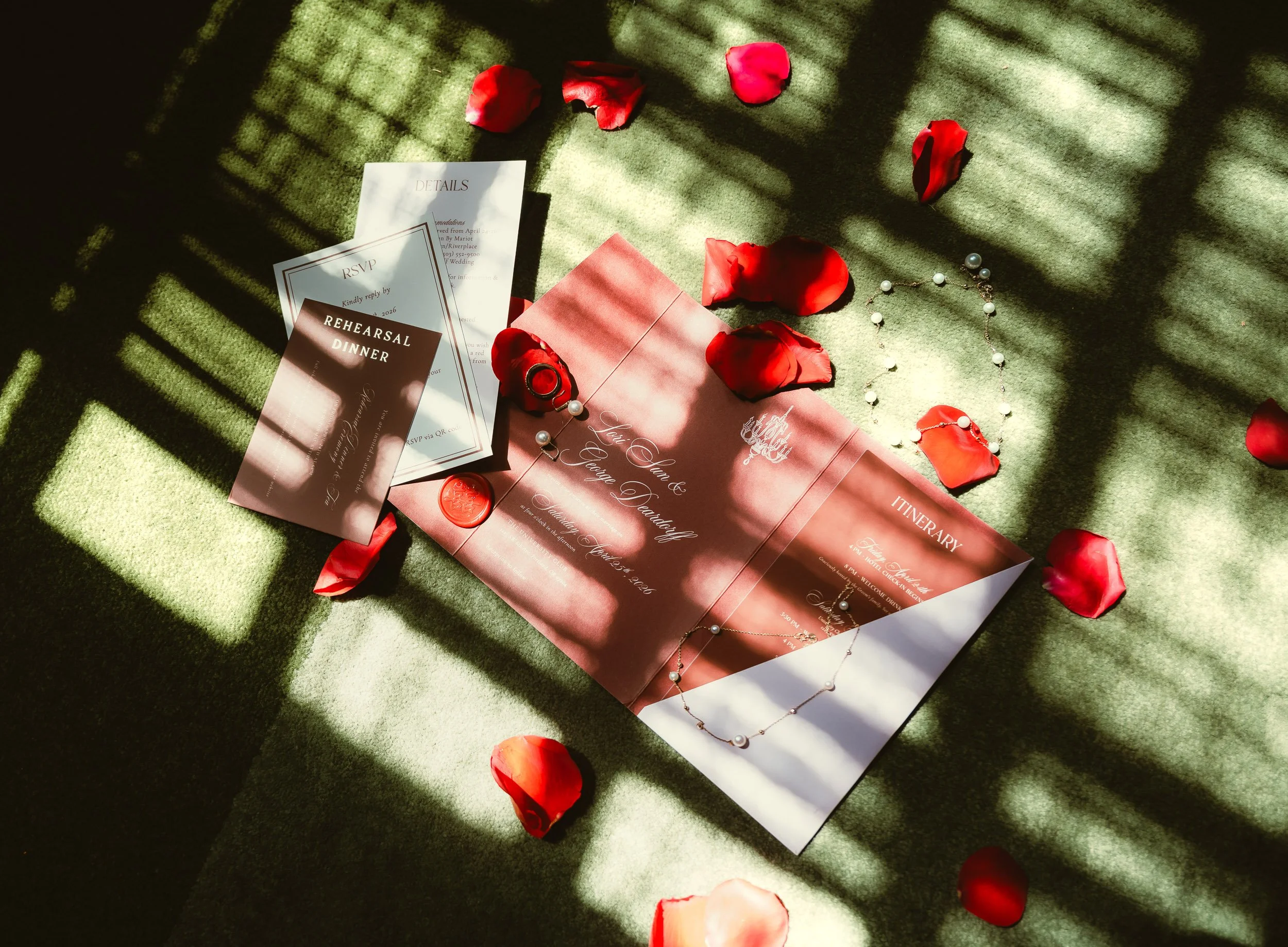 Wedding flat lay details featuring invitation suite, jewelry, perfume, rings, and bridal accessories for a University Club of Portland wedding day