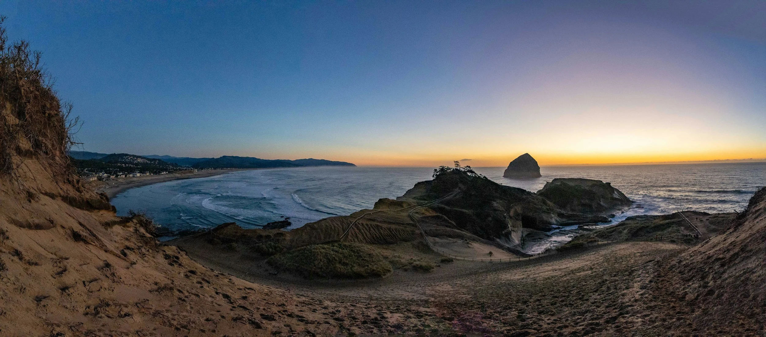 intimate wedding portraits on the cliffs at Cape Kiwanda overlooking the Oregon Coast