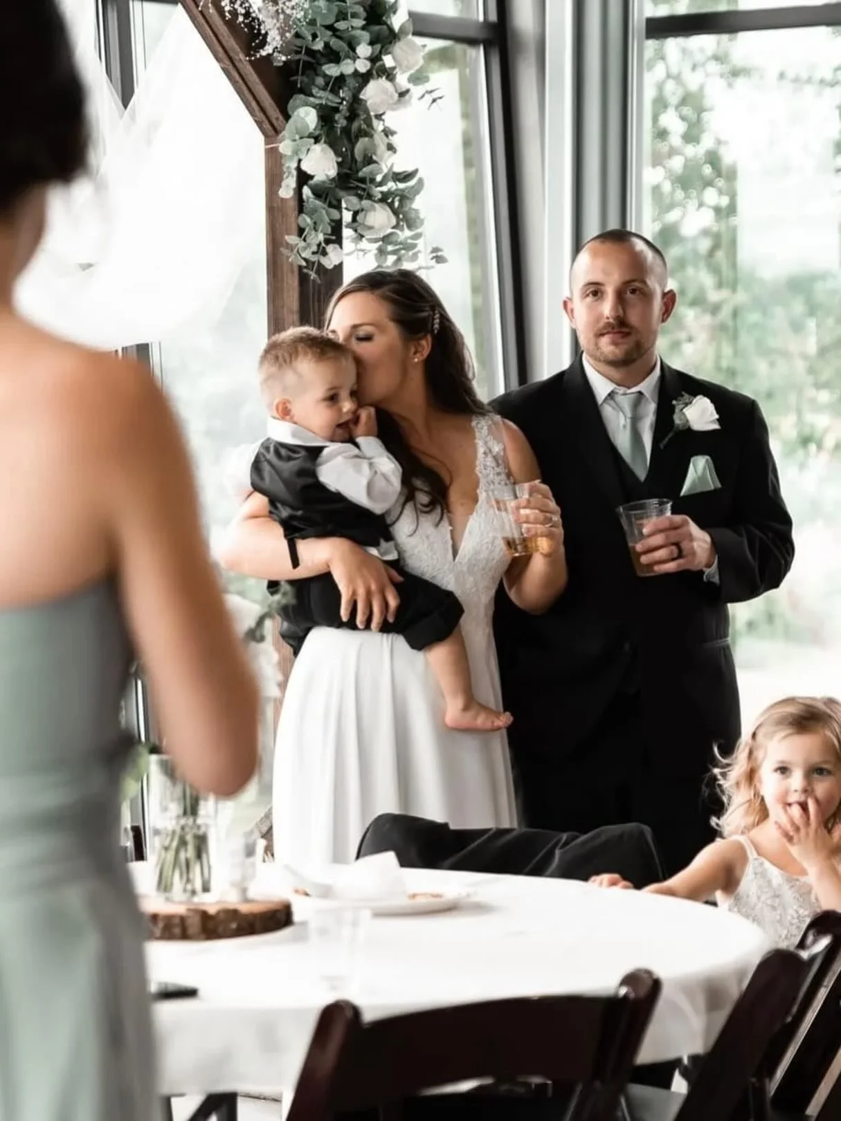 The reception is where a lot of the best unscripted wedding photos happen.

A toast starts. Kids move around the room. Someone laughs before they realize there is a camera nearby. The day starts to feel less scheduled and more lived-in.

I love photo