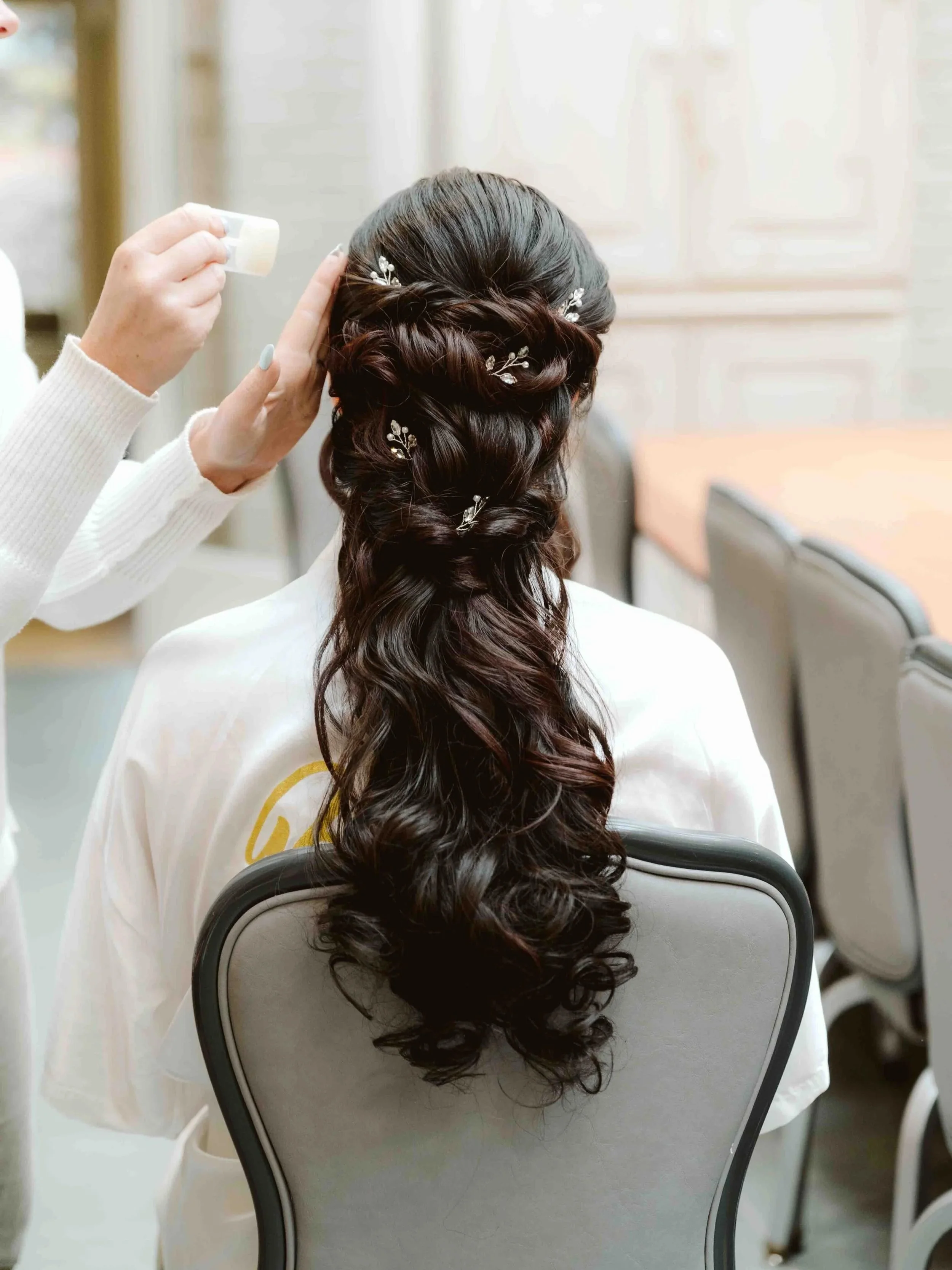 Getting ready photos can be some of the most useful images in a wedding gallery.

The dress is out, hair is being finished, people are moving in and out of the room, and the day has not fully picked up speed yet. These photos help document the part o