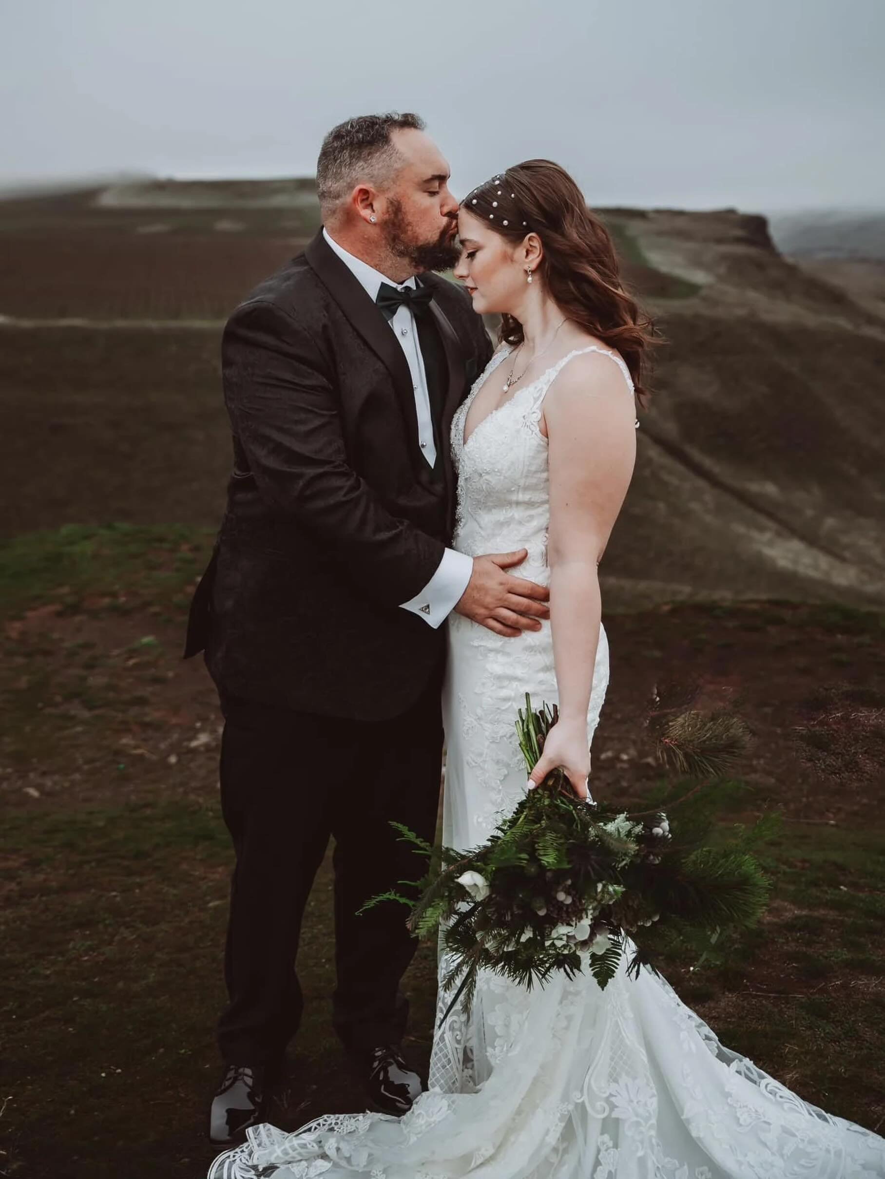 Wind, overcast skies, and a quiet portrait window in the Gorge.

I love when wedding portraits have a little movement in them: hair moving, flowers shifting, the couple settling into each other for a second before heading back to the rest of the day.