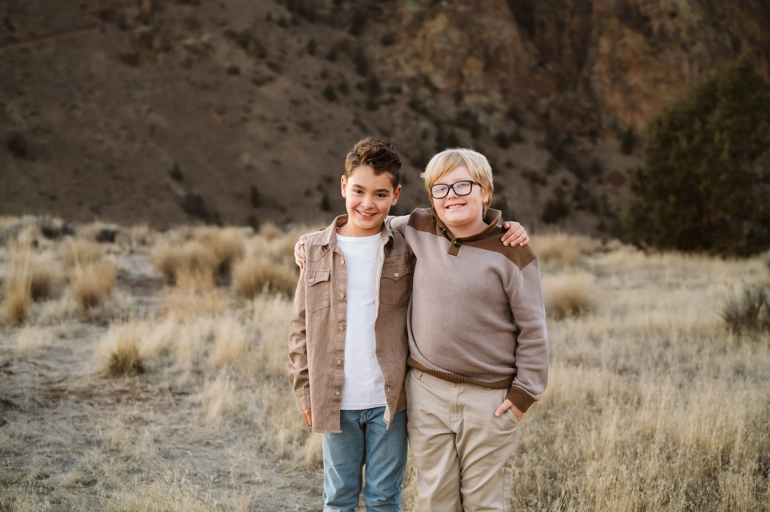 Sibling portrait photography in Oregon highlighting natural connection between brothers during a relaxed family session.